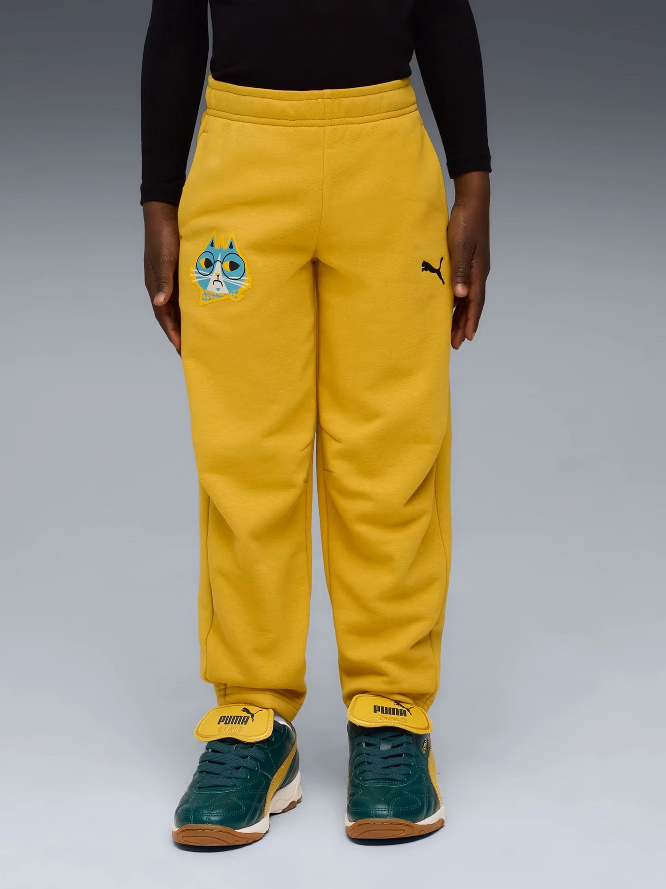 Штани PUMA MOODY CAT SWEATPANTS KIDS модель 63220962 Штани PUMA MOODY CAT SWEATPANTS KIDS модель 63220962 Фото