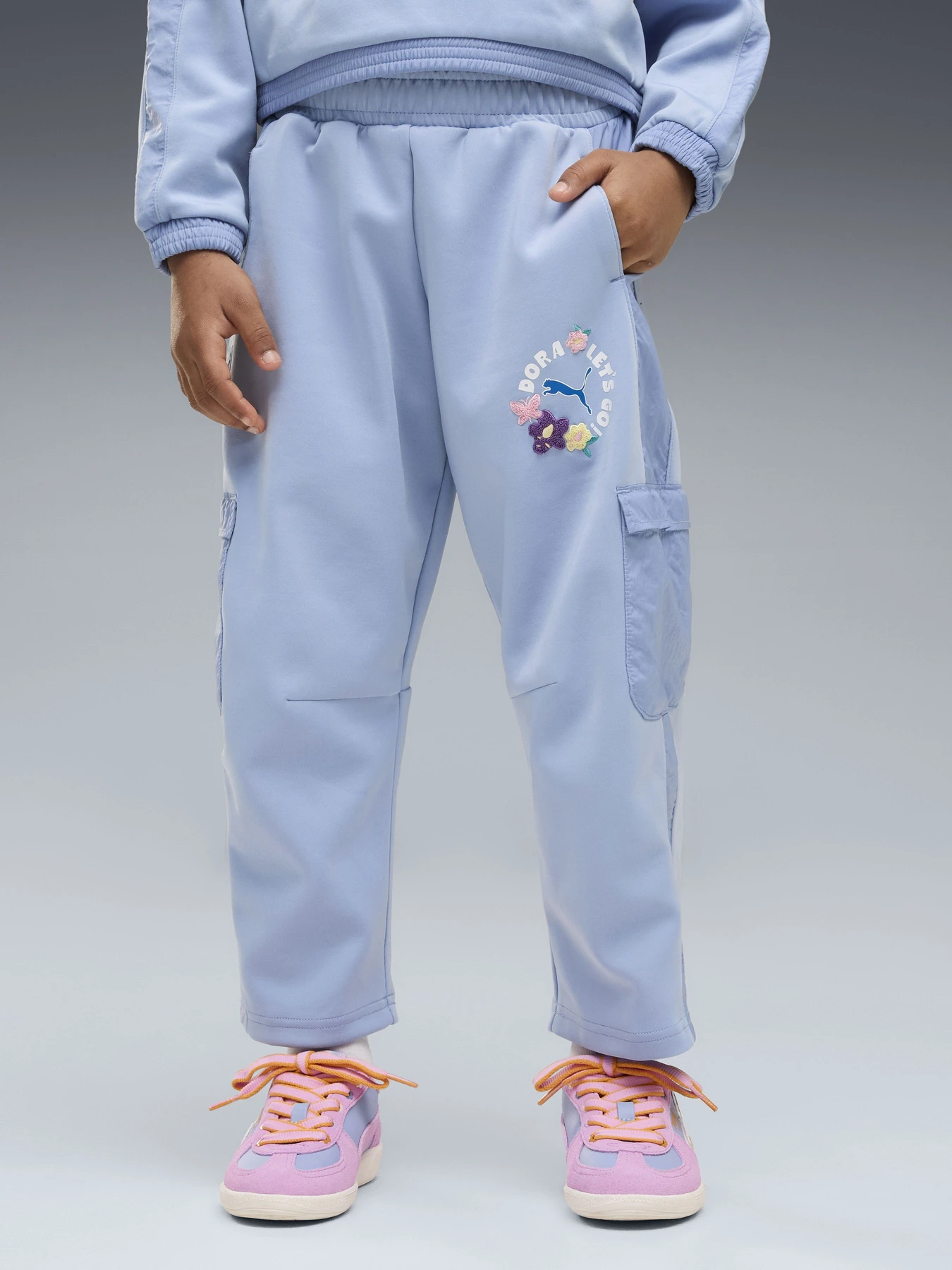 Брюки PUMA PUMA X DORA THE EXPLORER T7 модель 63763638 Брюки PUMA PUMA X DORA THE EXPLORER T7 модель 63763638 Фото