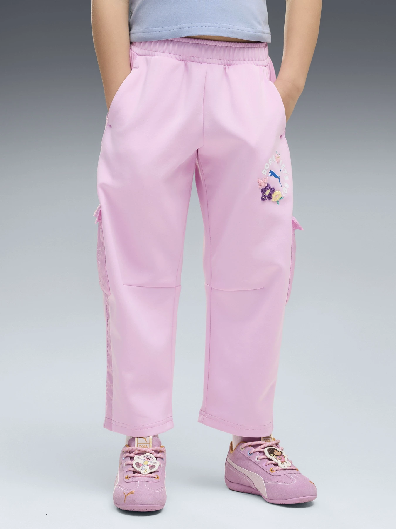 Брюки PUMA PUMA X DORA THE EXPLORER T7 модель 63763647 Брюки PUMA PUMA X DORA THE EXPLORER T7 модель 63763647 Фото