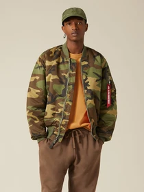Куртки и дубленки Alpha Industries Ma-1 модель MJM21000C1_961 Фото