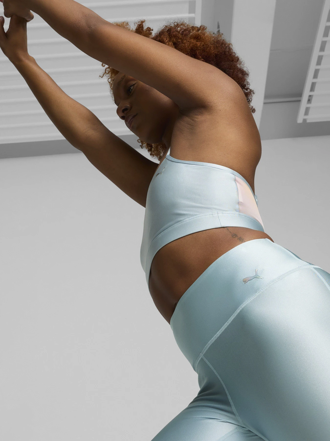 Штани PUMA SUMMER DAZE 7/8 HIGH-WAISTED модель 52482222 Фото