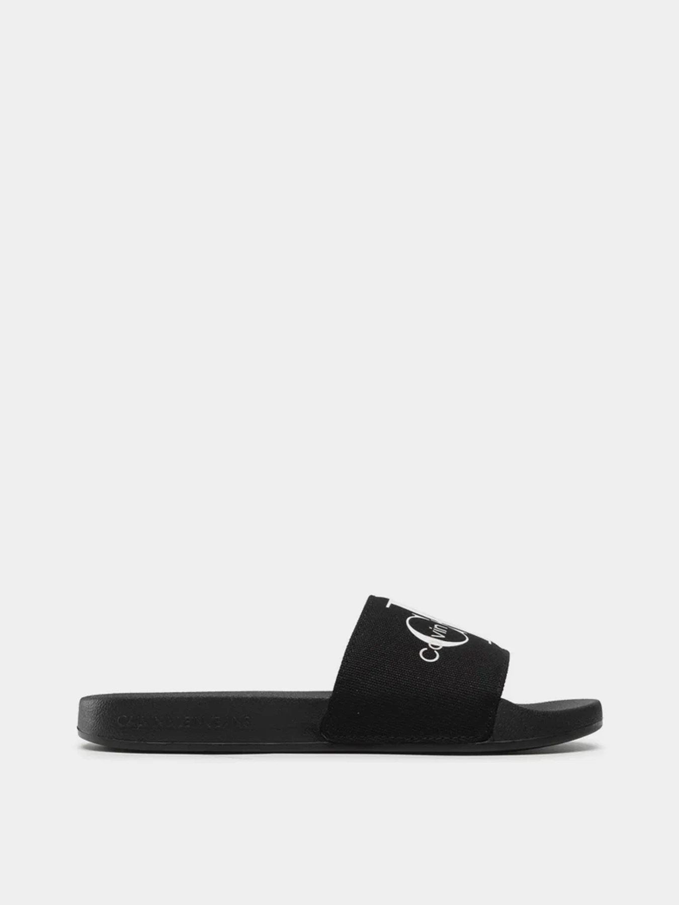 Шлёпанцы Calvin Klein Slide Monogram Co модель YW0YW00103-BDS Шлёпанцы Calvin Klein Slide Monogram Co модель YW0YW00103-BDS Фото