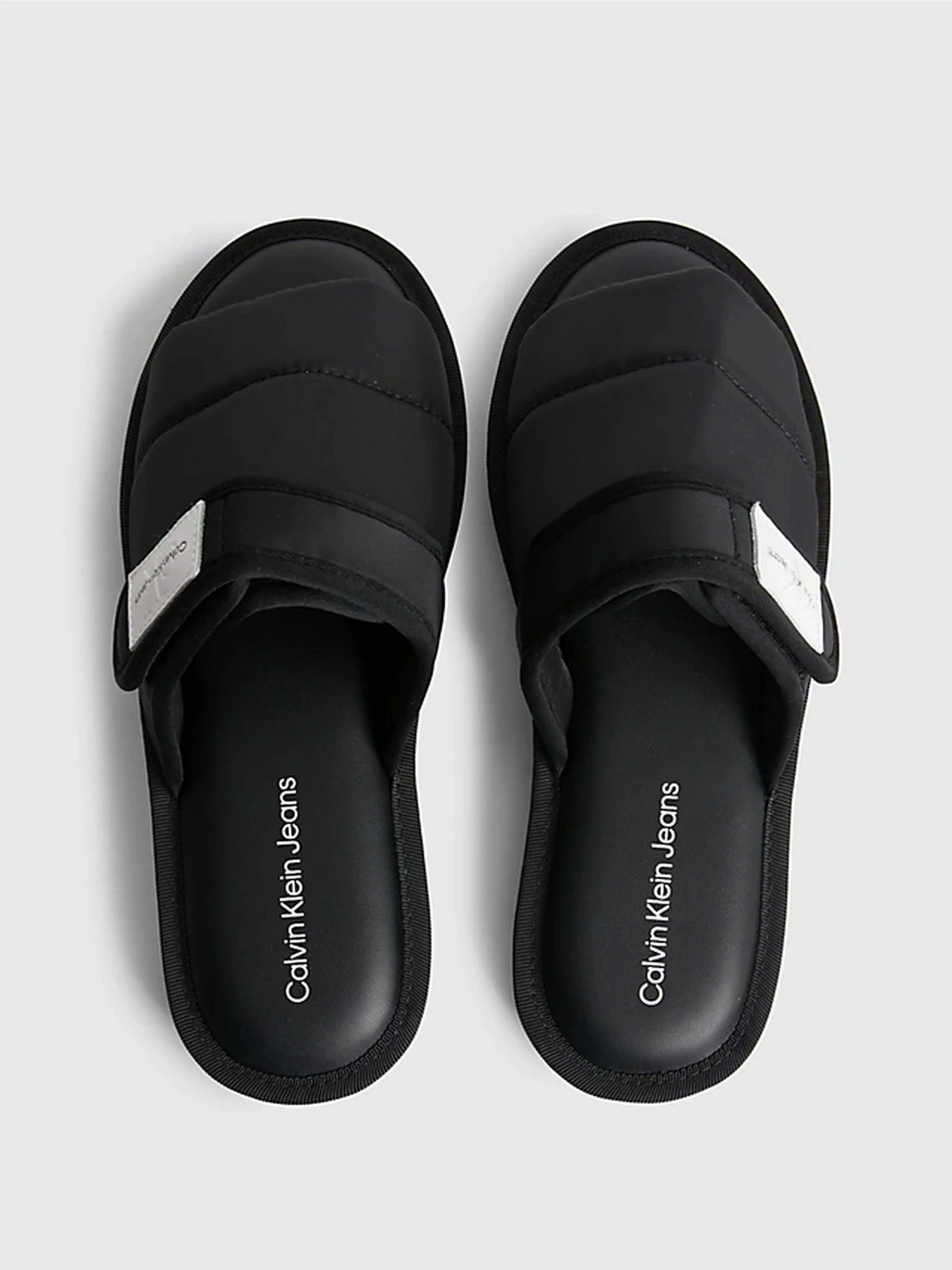 Шлёпанцы Calvin Klein Recycled Puffer Slippers модель YW0YW00971-BDS Шлёпанцы Calvin Klein Recycled Puffer Slippers модель YW0YW00971-BDS Фото
