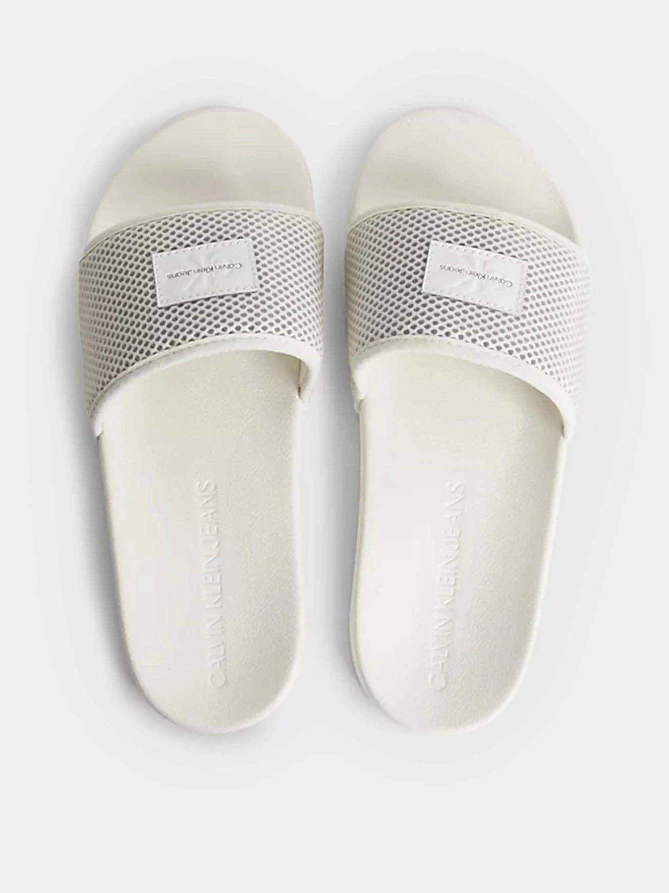 Шлёпанцы Calvin Klein модель YW0YW00997-0K7 Шлёпанцы Calvin Klein модель YW0YW00997-0K7 Фото