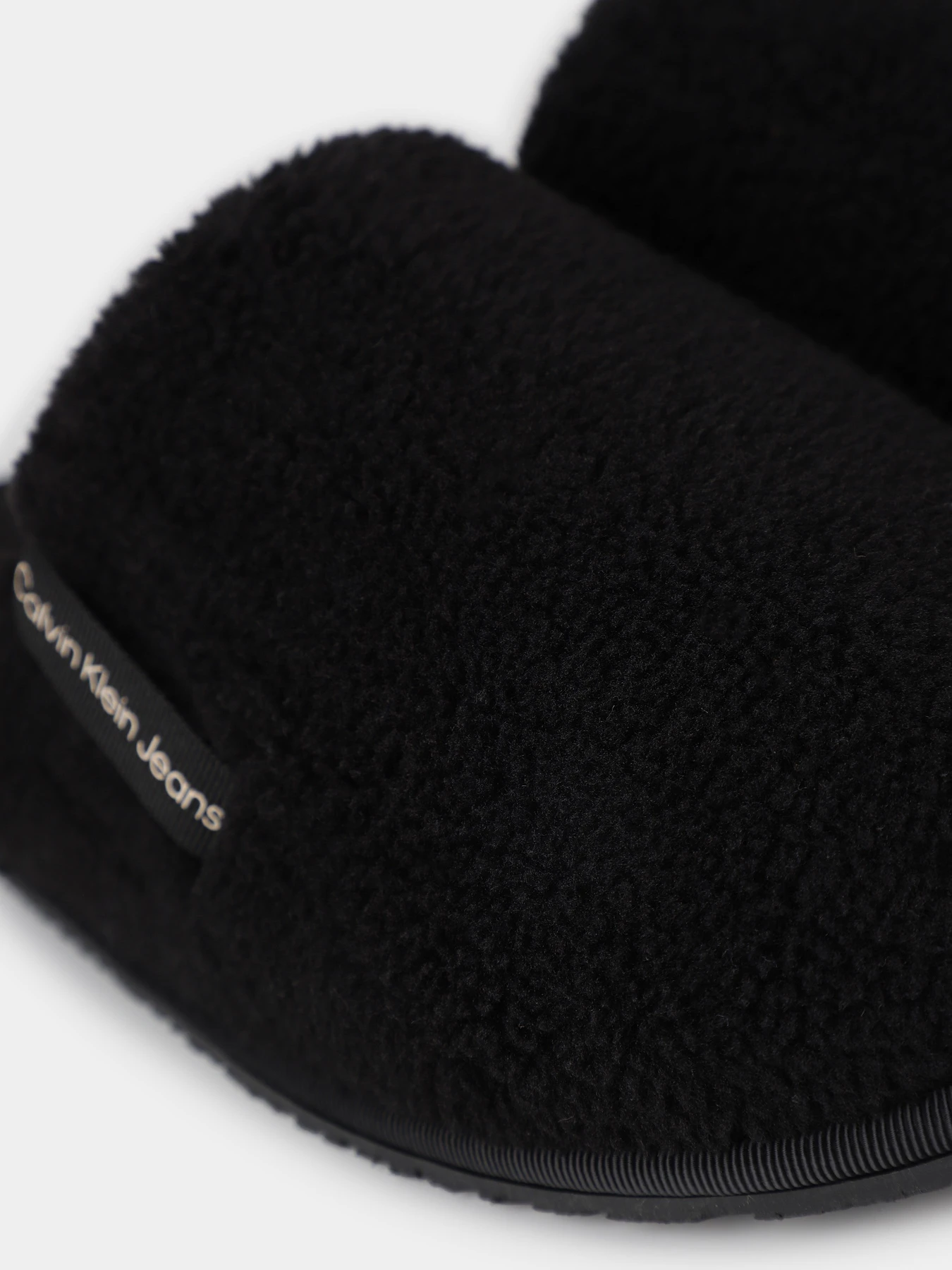 Тапки Calvin Klein Faux Shearling Slippers модель YW0YW01148-0GX Тапки Calvin Klein Faux Shearling Slippers модель YW0YW01148-0GX Фото