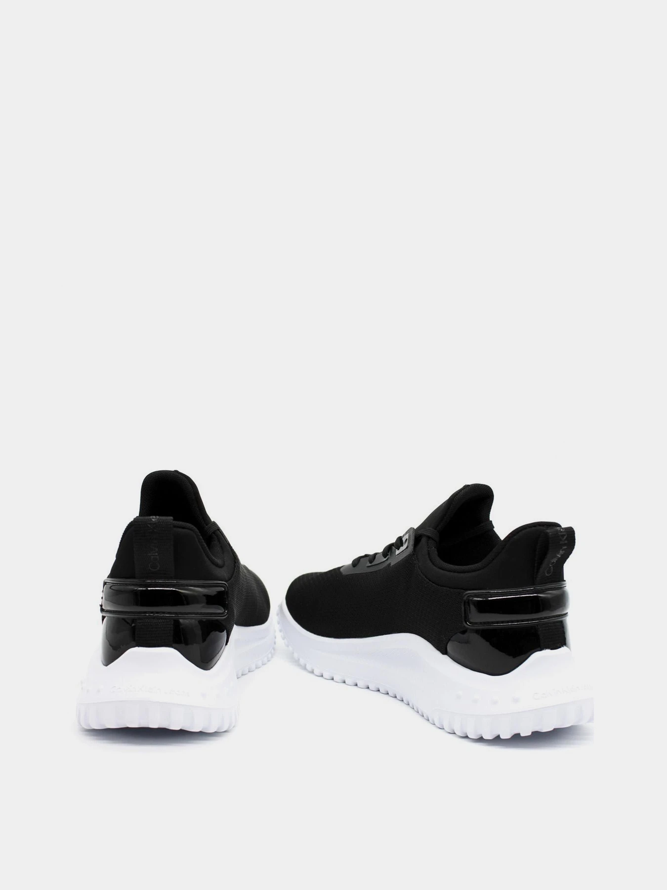 Кросівки Calvin Klein Eva Run Slipon Lace Mix Lum Wn модель YW0YW01303-0GM Кросівки Calvin Klein Eva Run Slipon Lace Mix Lum Wn модель YW0YW01303-0GM Фото