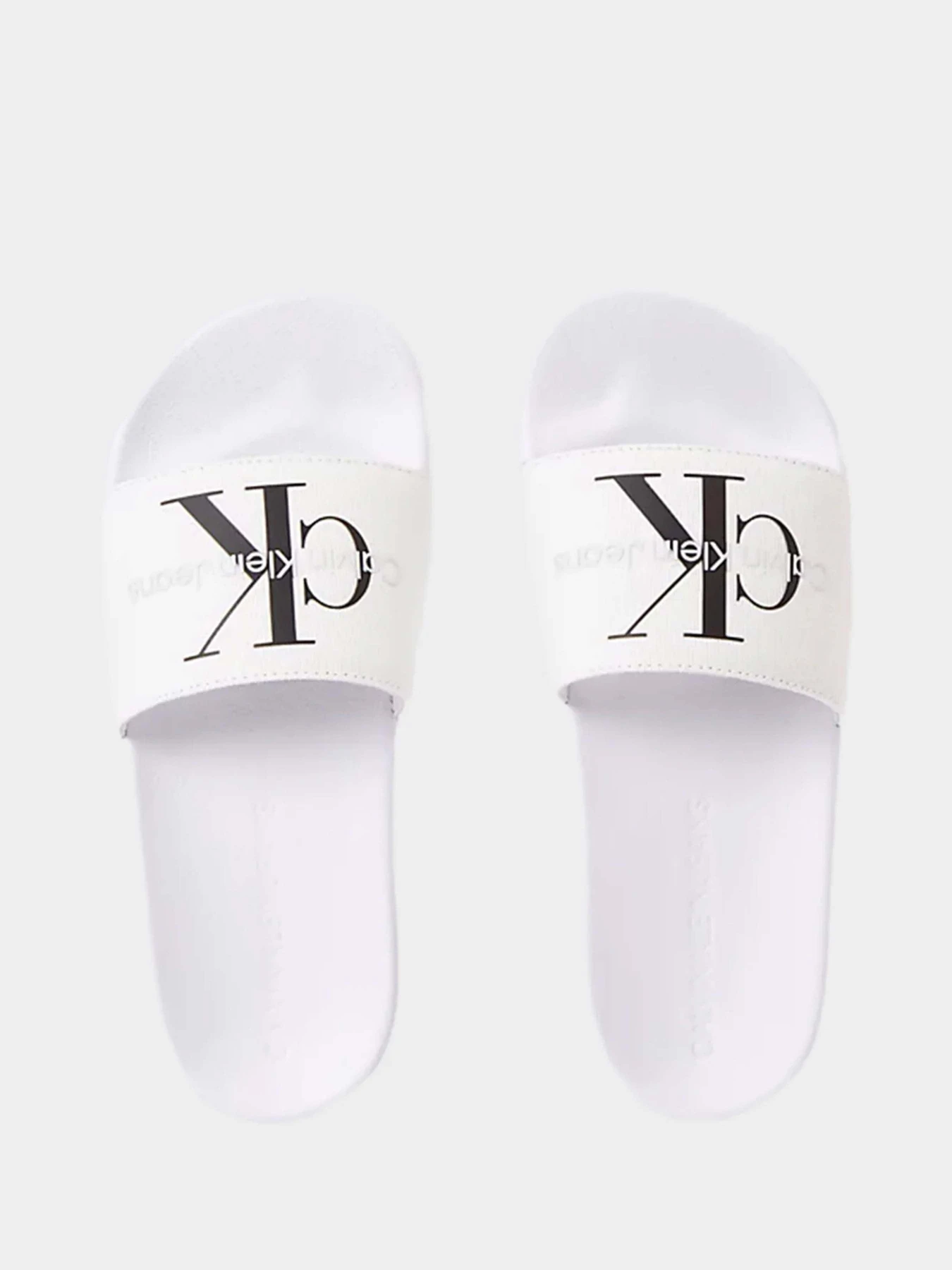 Шлёпанцы Calvin Klein Slide Monogram Co модель YW0YW00103-01W Фото