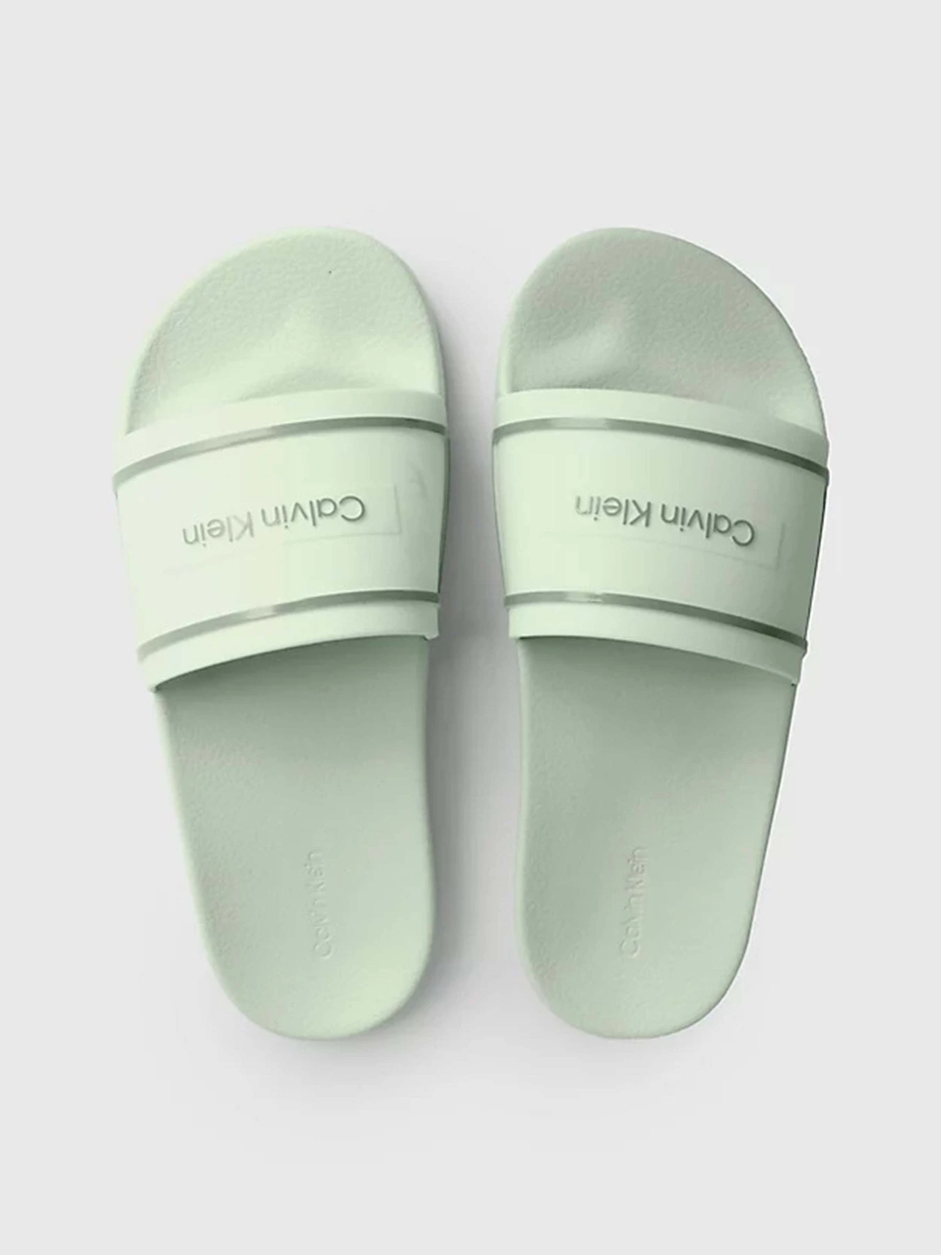 Шлёпанцы Calvin Klein Pool Slide Deboss Logo Tpu модель HW0HW01976-LIA Шлёпанцы Calvin Klein Pool Slide Deboss Logo Tpu модель HW0HW01976-LIA Фото