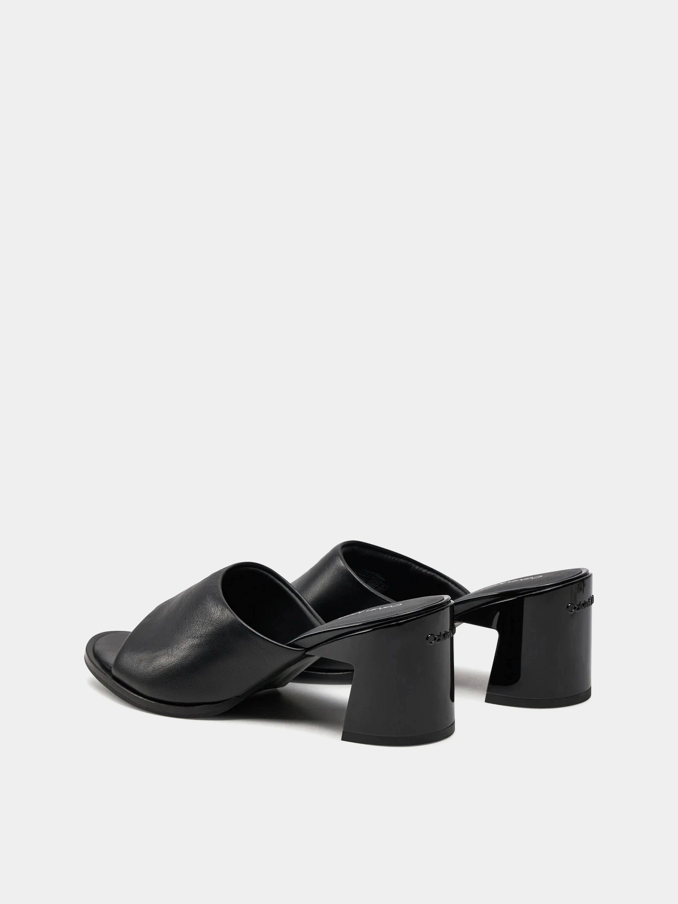 Шльопанці Calvin Klein Heel Mule 60 Lth модель HW0HW01941-BEH Фото