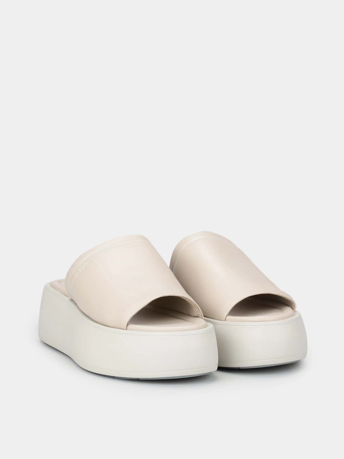 Шльопанці Calvin Klein Flatform Slide Lth модель HW0HW01943-0F8 Шльопанці Calvin Klein Flatform Slide Lth модель HW0HW01943-0F8 Фото