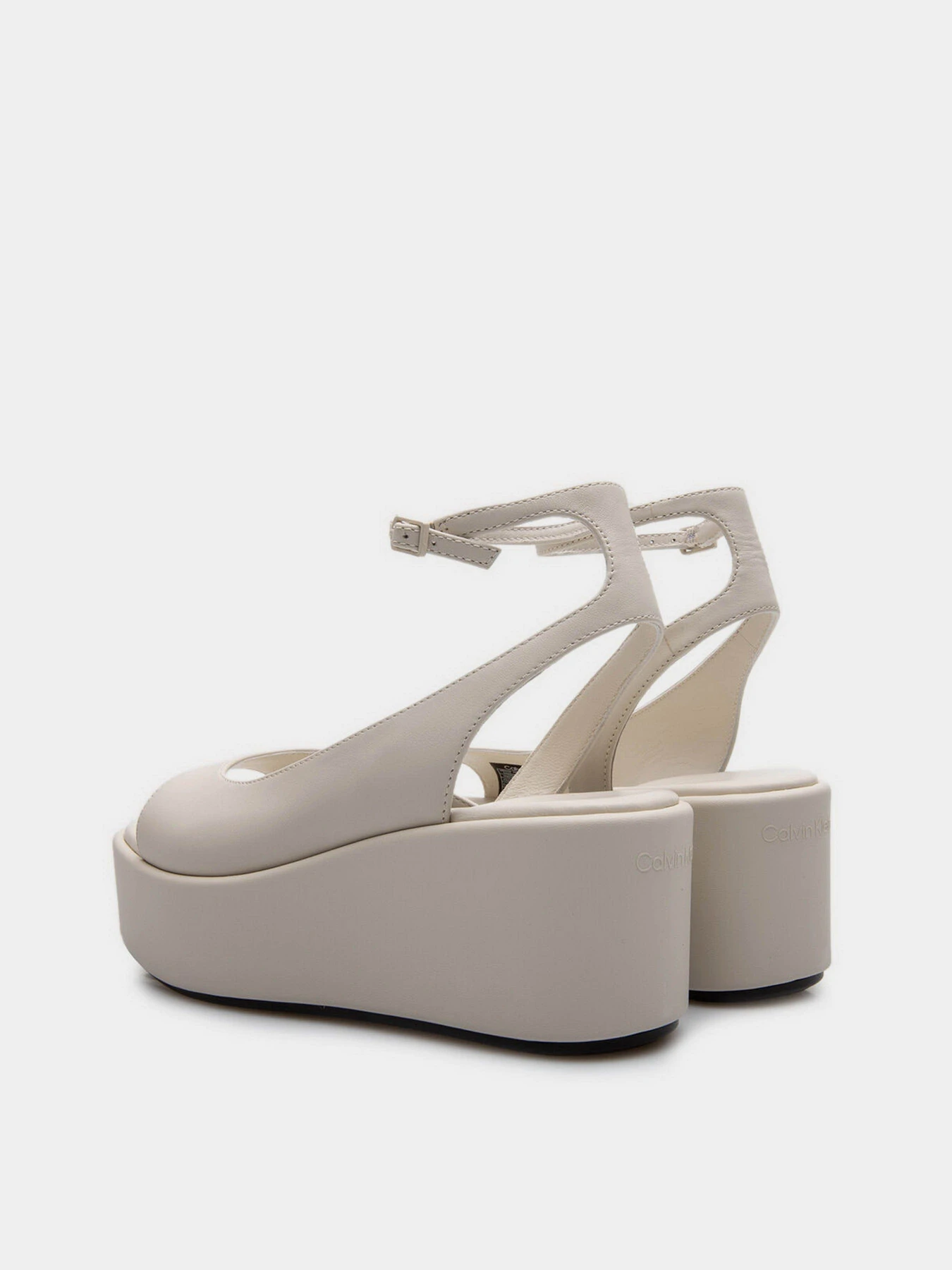 Босоножки Calvin Klein Wedge Peep Toe Sandal 30 Lth модель HW0HW01950-ACG Босоножки Calvin Klein Wedge Peep Toe Sandal 30 Lth модель HW0HW01950-ACG Фото