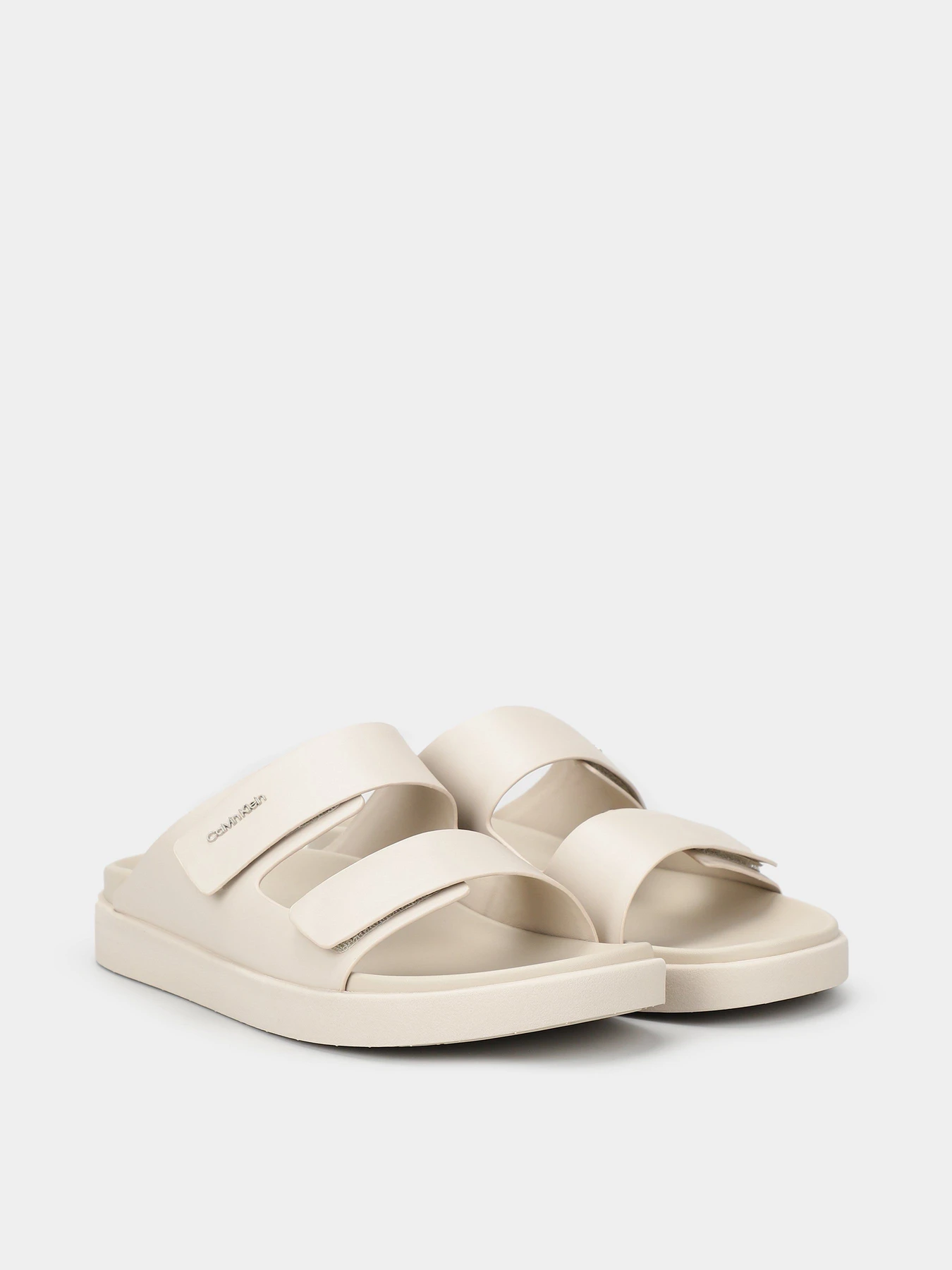 Шльопанці Calvin Klein Flat Adj Slide Calvin Mtl Lth модель HW0HW01954-ACE Фото