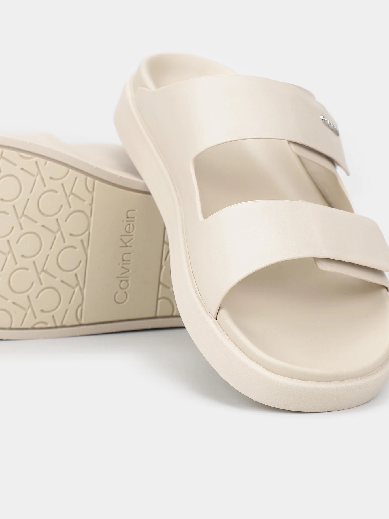 Шльопанці Calvin Klein Flat Adj Slide Calvin Mtl Lth модель HW0HW01954-ACE Фото