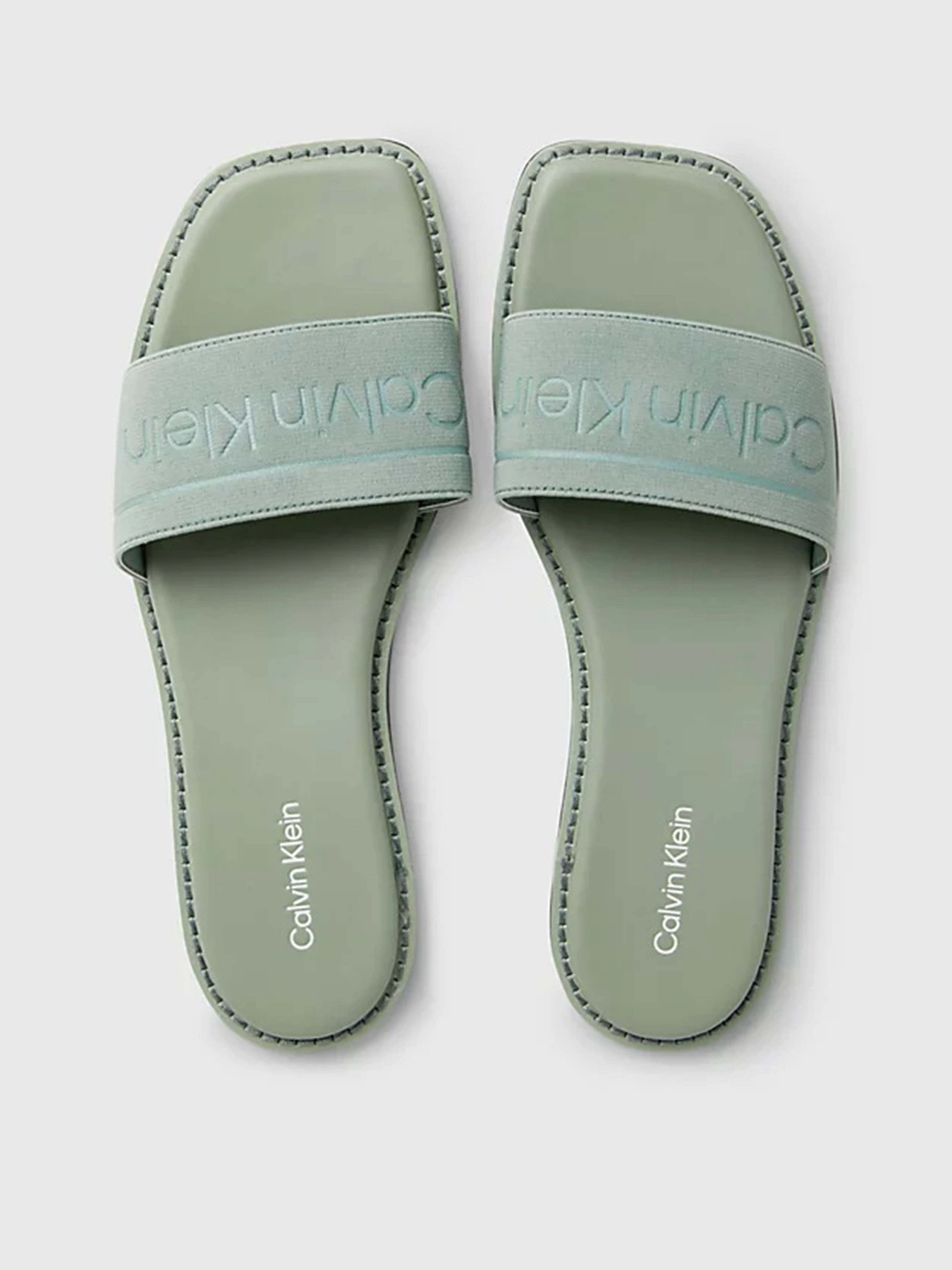 Шльопанці Calvin Klein Flat Slide He модель HW0HW01989-0H7 Шльопанці Calvin Klein Flat Slide He модель HW0HW01989-0H7 Фото