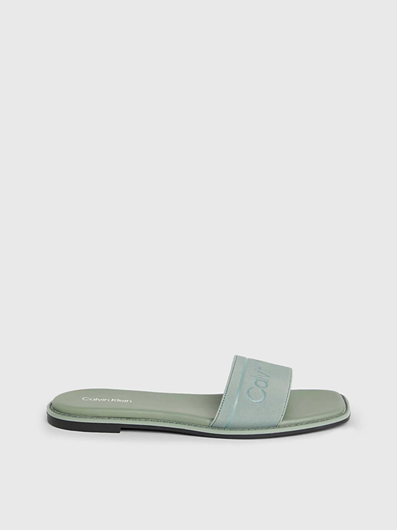 Шльопанці Calvin Klein Flat Slide He модель HW0HW01989-0H7 Шльопанці Calvin Klein Flat Slide He модель HW0HW01989-0H7 Фото