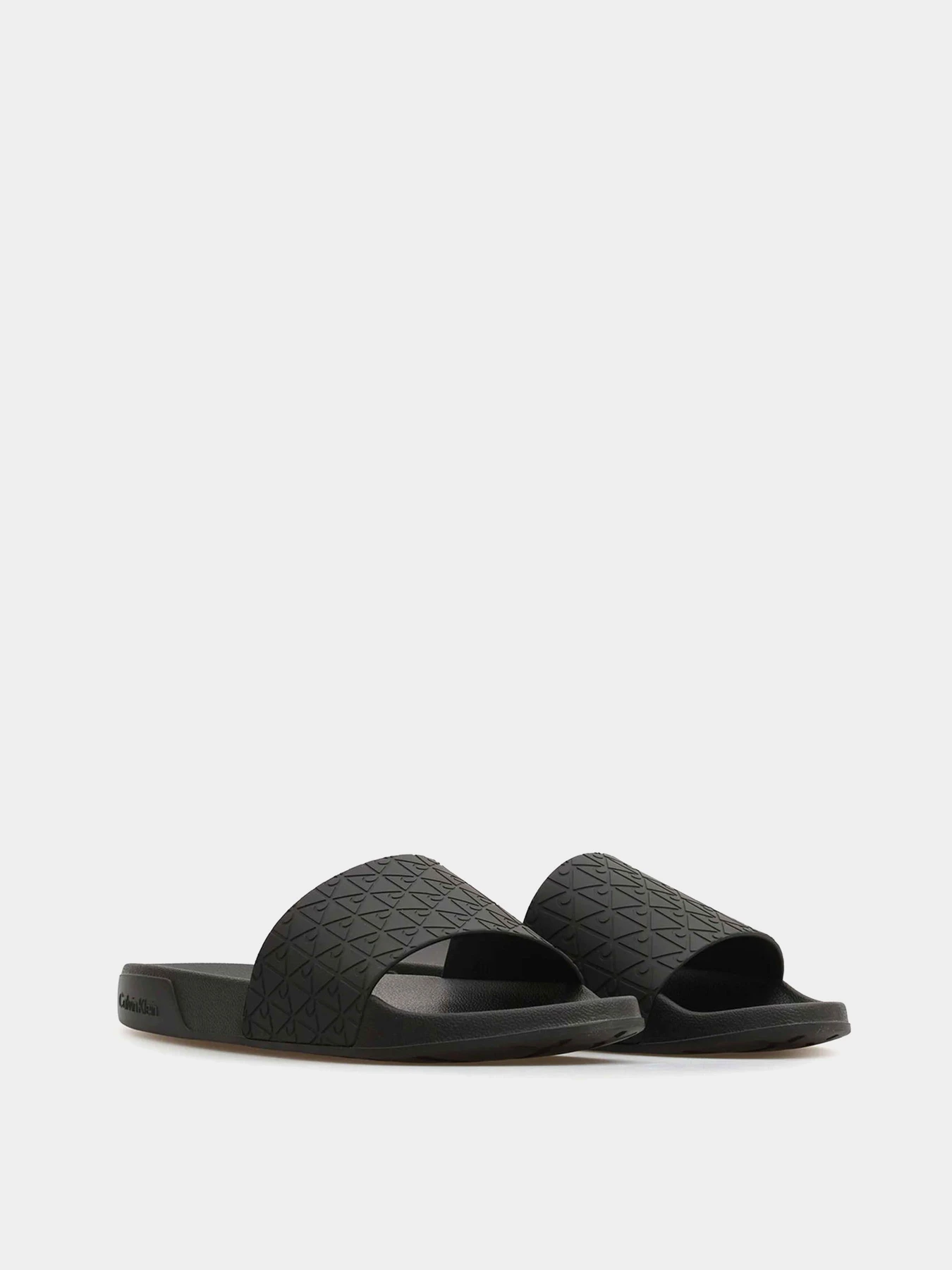 Шлёпанцы Calvin Klein ESS SLIDE PU AOP модель HW0HW03024-0GT Шлёпанцы Calvin Klein ESS SLIDE PU AOP модель HW0HW03024-0GT Фото