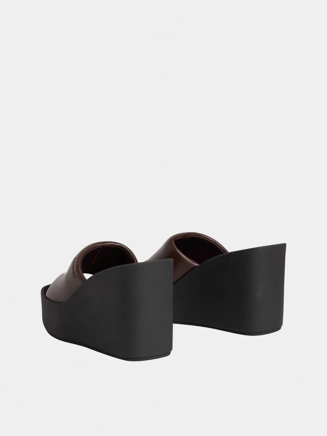 Шлёпанцы Calvin Klein WEDGE 70 SNDL MULE LTH модель HW0HW02881-0HN Шлёпанцы Calvin Klein WEDGE 70 SNDL MULE LTH модель HW0HW02881-0HN Фото