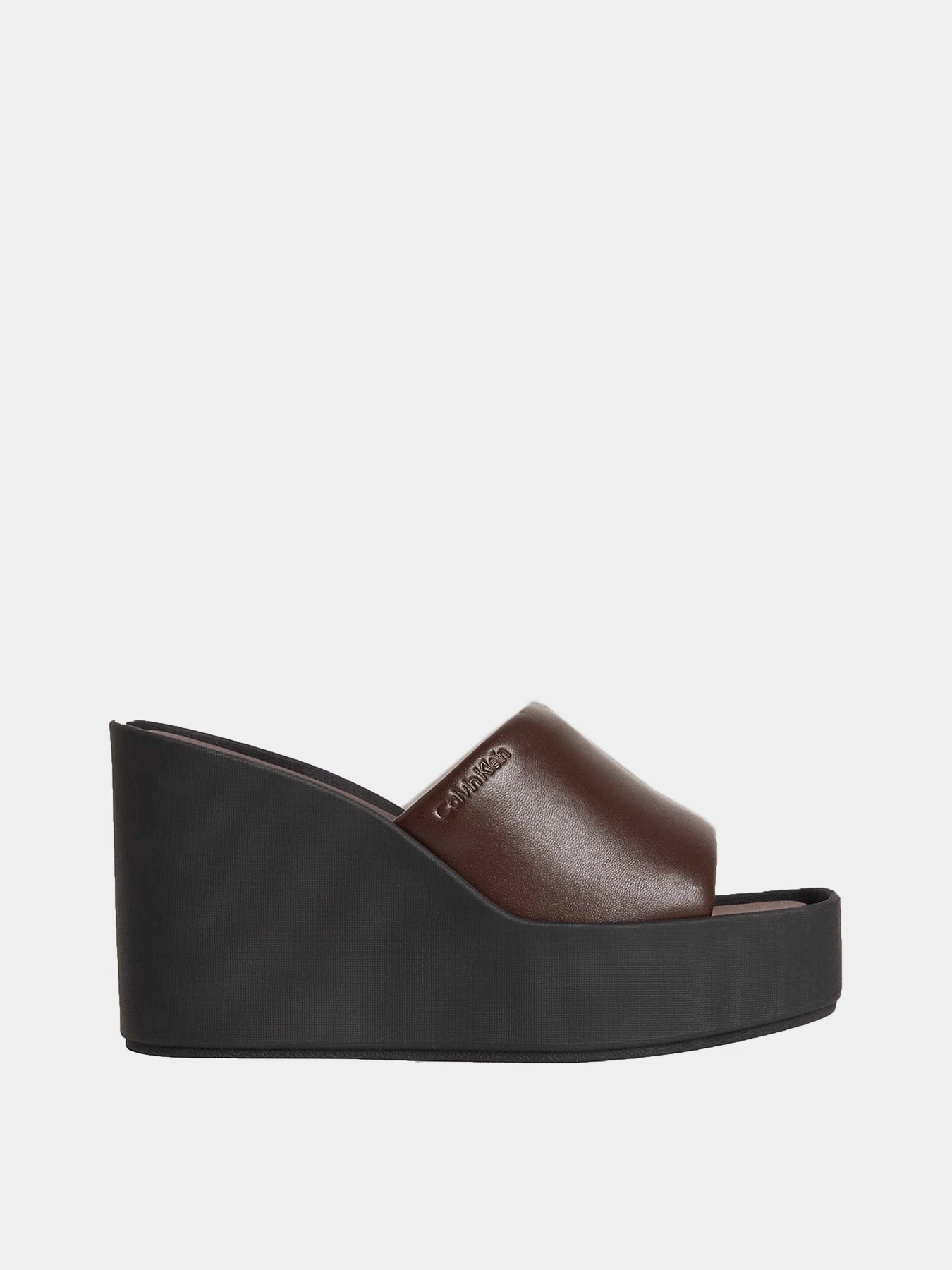 Шлёпанцы Calvin Klein WEDGE 70 SNDL MULE LTH модель HW0HW02881-0HN Шлёпанцы Calvin Klein WEDGE 70 SNDL MULE LTH модель HW0HW02881-0HN Фото
