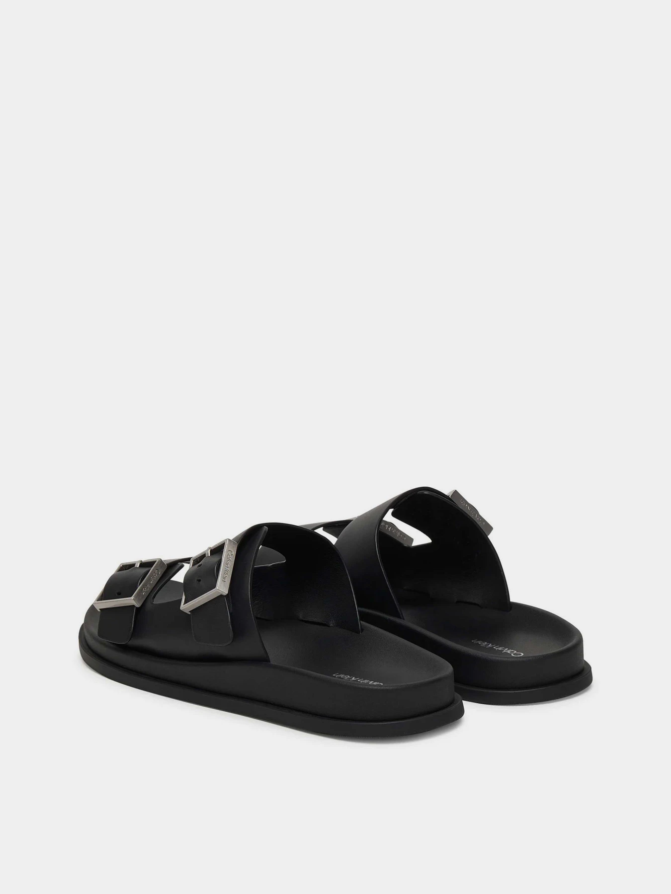 Шлёпанцы Calvin Klein CITY SANDAL BUCKLE LTH модель HW0HW02885-0GJ Шлёпанцы Calvin Klein CITY SANDAL BUCKLE LTH модель HW0HW02885-0GJ Фото