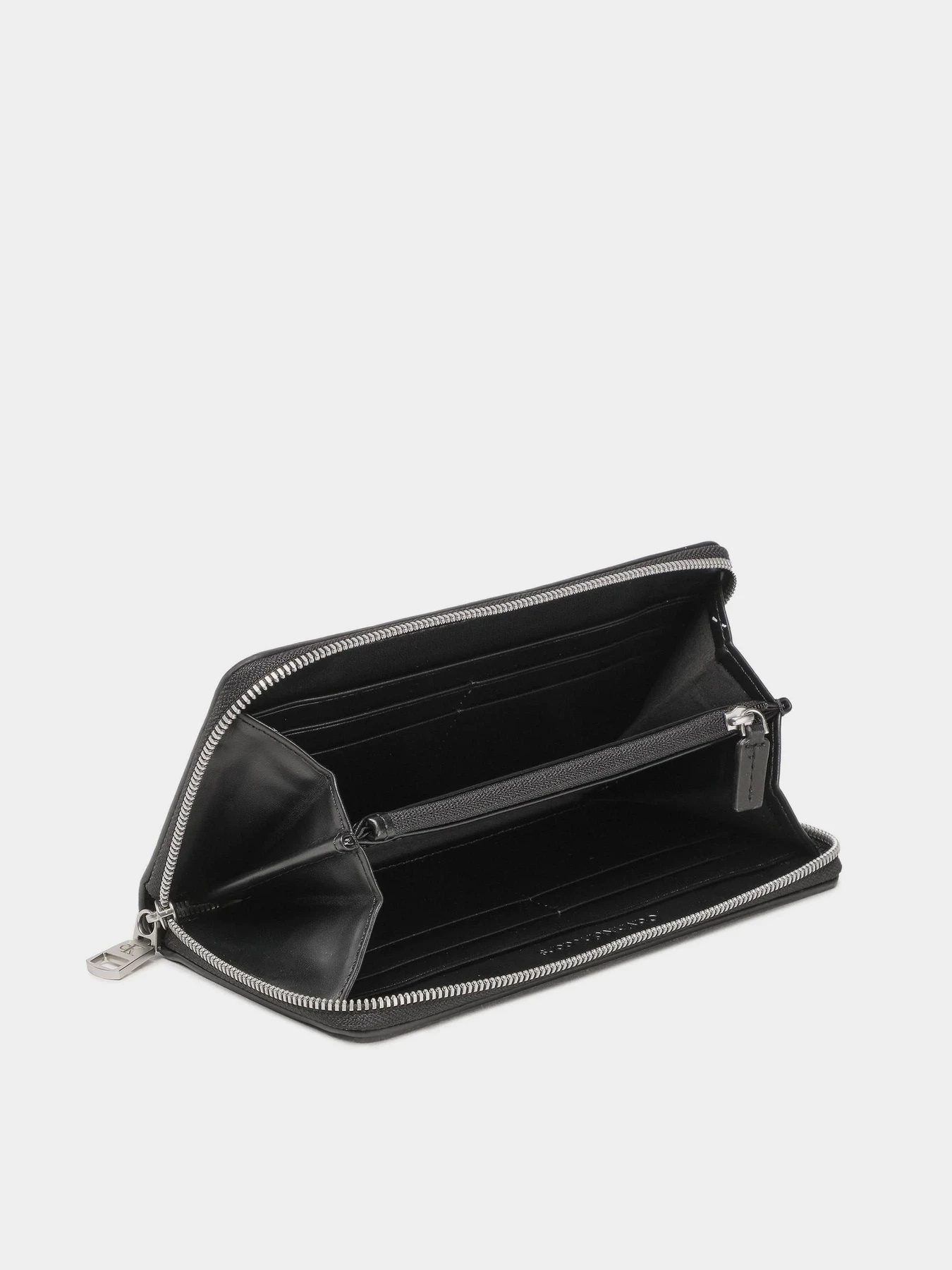 Кошельки Calvin Klein Sculpted Mono Zip Around Mono модель K60K607634-0GN Фото