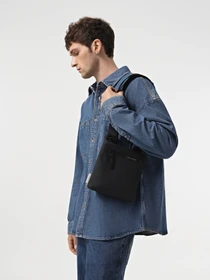 Сумки Calvin Klein Rubberized Conv Flatpack S модель K50K510795-BAX Фото