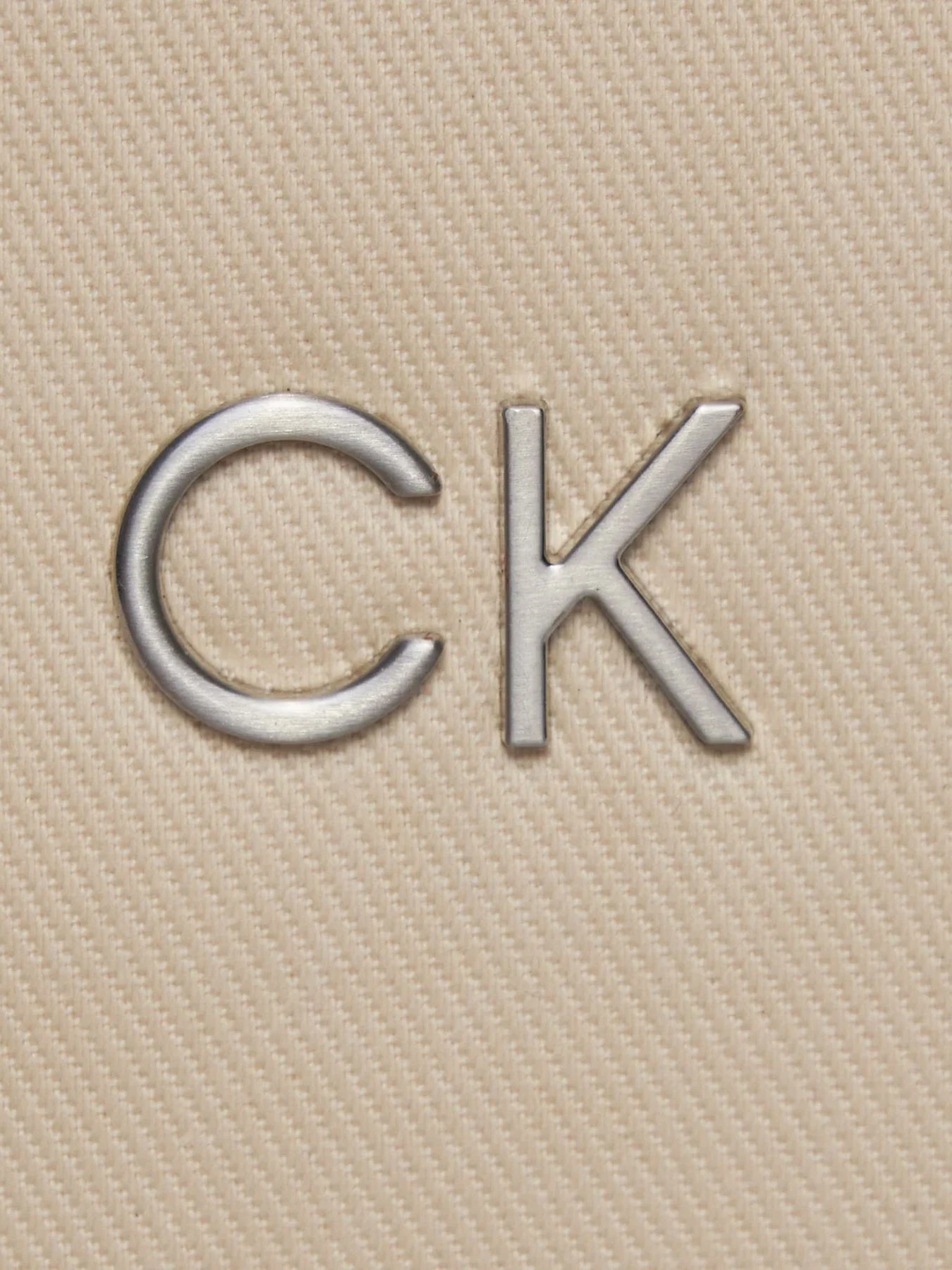 Сумки Calvin Klein Re-Lock Seasonal Xbody Sm_Canvas модель K60K611793-PC4 Фото
