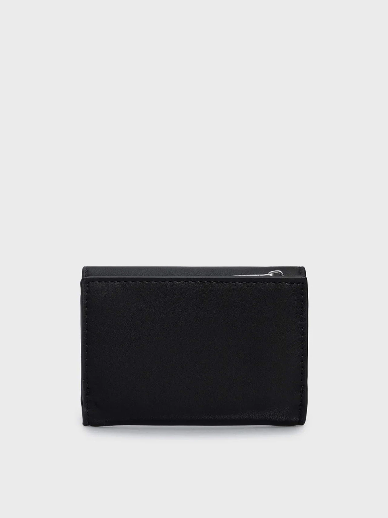 Гаманці Calvin Klein Ck Must Trifold Sm модель K60K607251-BEH Фото