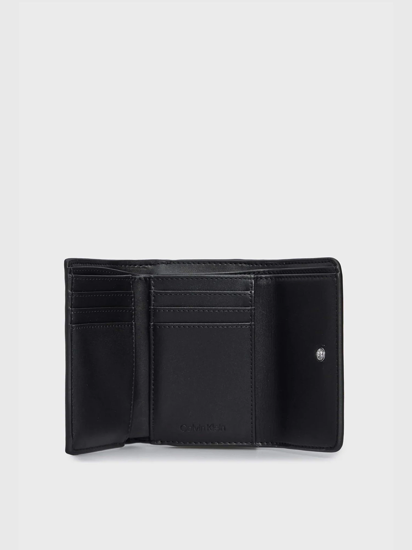 Гаманці Calvin Klein Ck Must Trifold Sm модель K60K607251-BEH Фото
