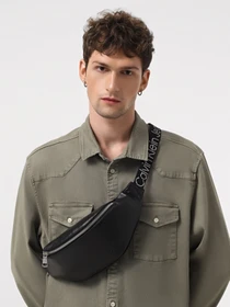 Сумки Calvin Klein Ultralight Waistbag 38 Pu модель K50K511491-BEH Фото