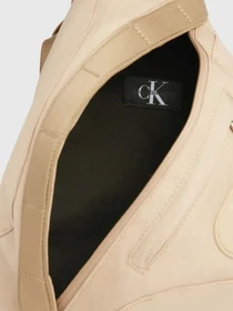 Сумки Calvin Klein Metaforms Rounded Cb Sling38 модель K50K511733-PF2 Фото