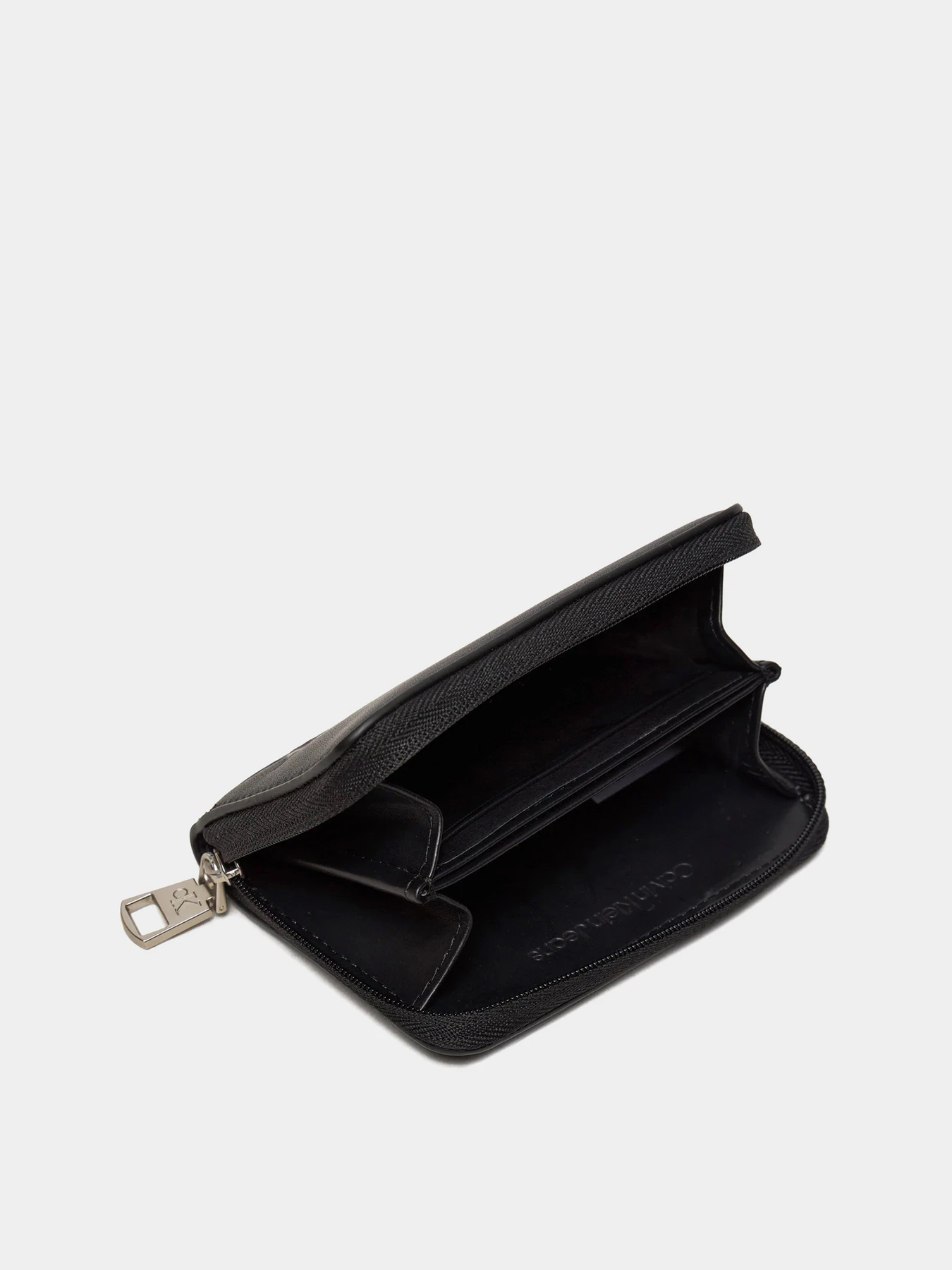 Гаманці Calvin Klein Block Med Zip Around модель K60K612254-BEH Гаманці Calvin Klein Block Med Zip Around модель K60K612254-BEH Фото
