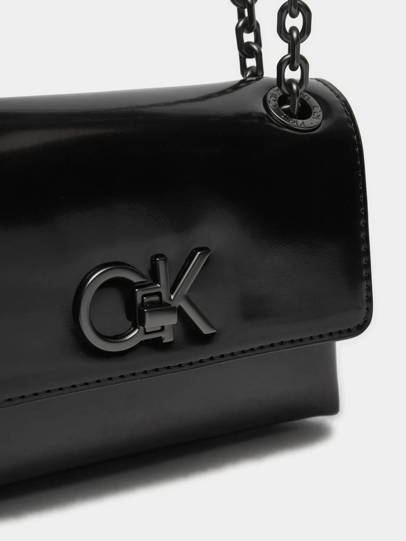 Сумки Calvin Klein Re-Lock Sm Shoulder модель K60K612558-BEH Сумки Calvin Klein Re-Lock Sm Shoulder модель K60K612558-BEH Фото