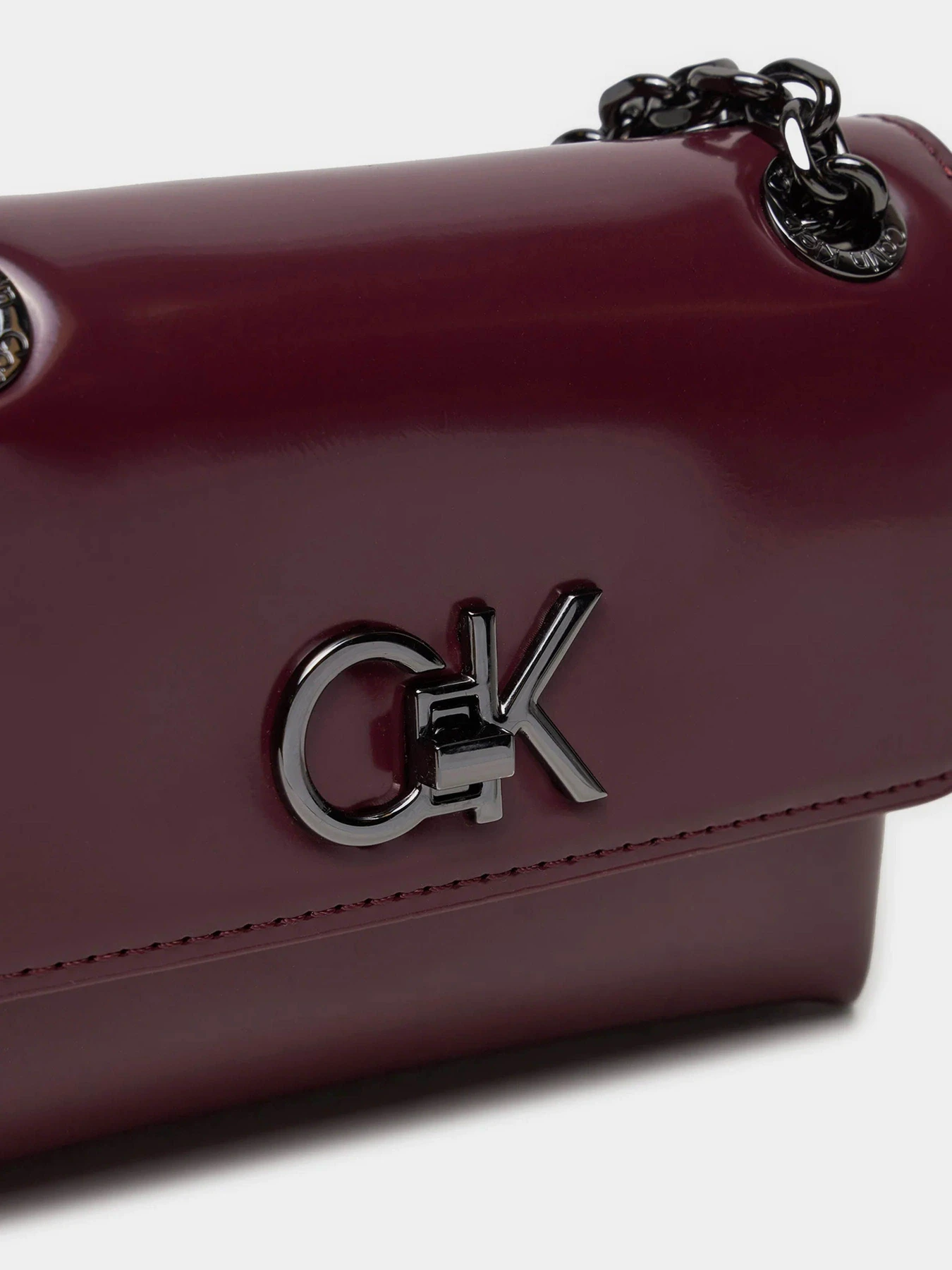 Сумки Calvin Klein Re-Lock Sm Shoulder модель K60K612558-VLP Сумки Calvin Klein Re-Lock Sm Shoulder модель K60K612558-VLP Фото