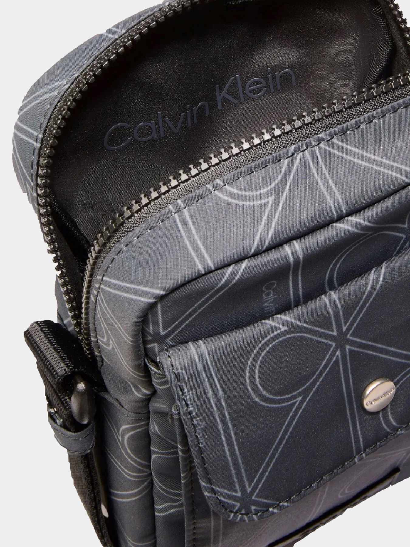 Сумки Calvin Klein PRINTED EMBLEM AOP NYLON SLIM модель LV04D3230G-8MN Фото