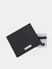 Кошельки Calvin Klein PLAQUE EW BILLFOLD модель LV04D1066G-UB1 Фото