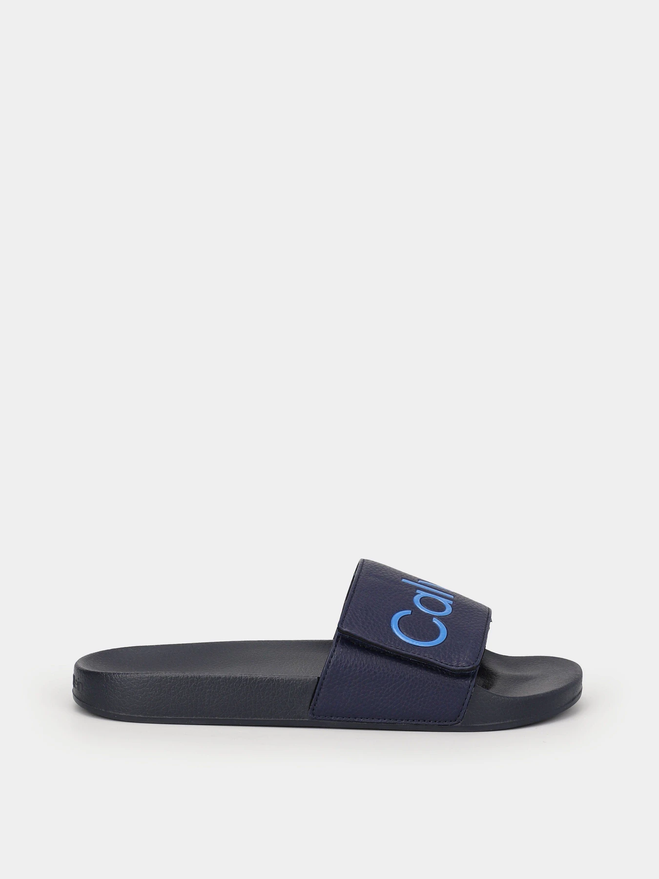 Шльопанці Calvin Klein Adj Pool Slide Pu модель HM0HM00957-DW4 Шльопанці Calvin Klein Adj Pool Slide Pu модель HM0HM00957-DW4 Фото