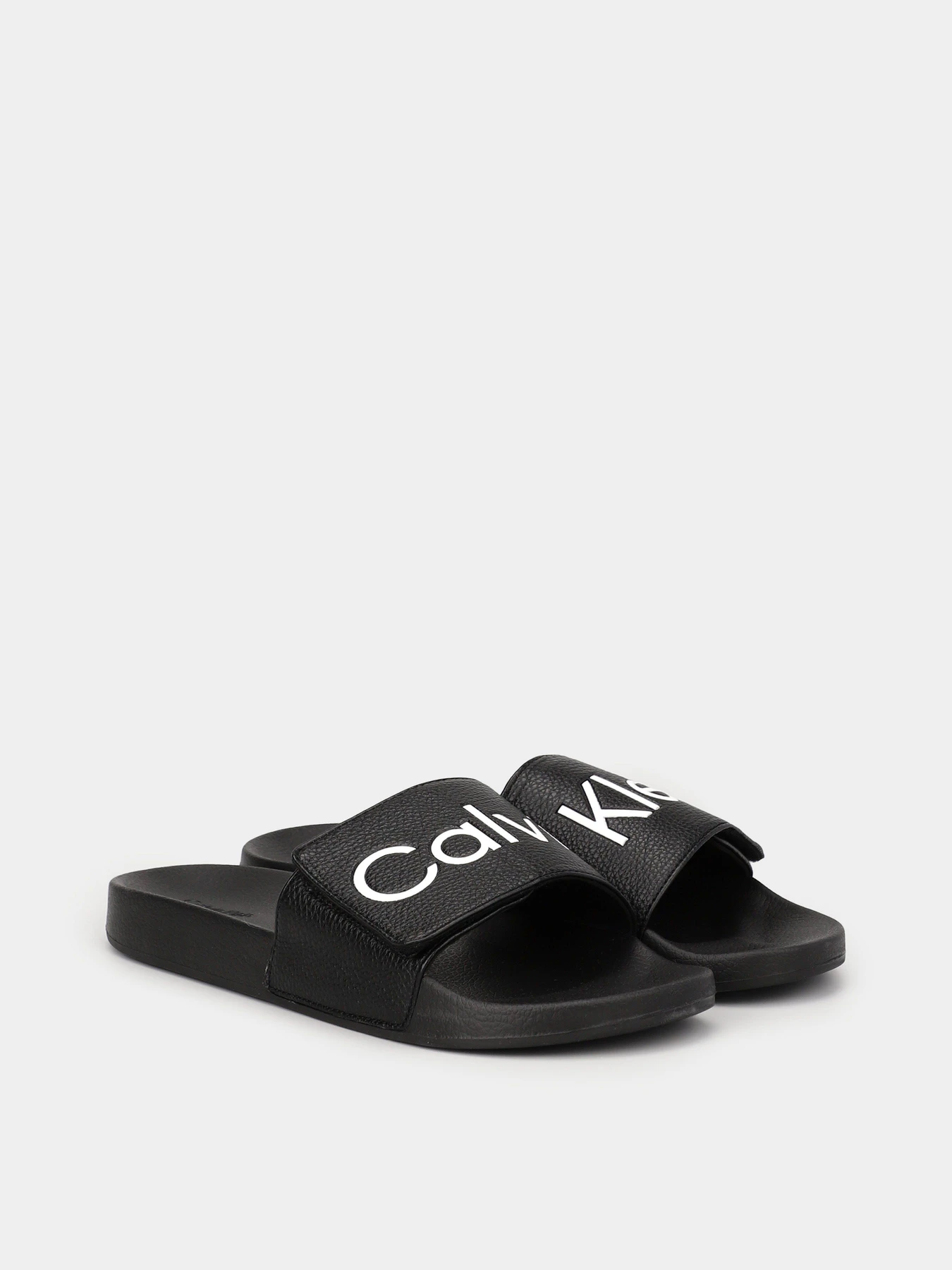 Шлёпанцы Calvin Klein Adj Pool Slide Pu модель HM0HM00957-BEH Шлёпанцы Calvin Klein Adj Pool Slide Pu модель HM0HM00957-BEH Фото