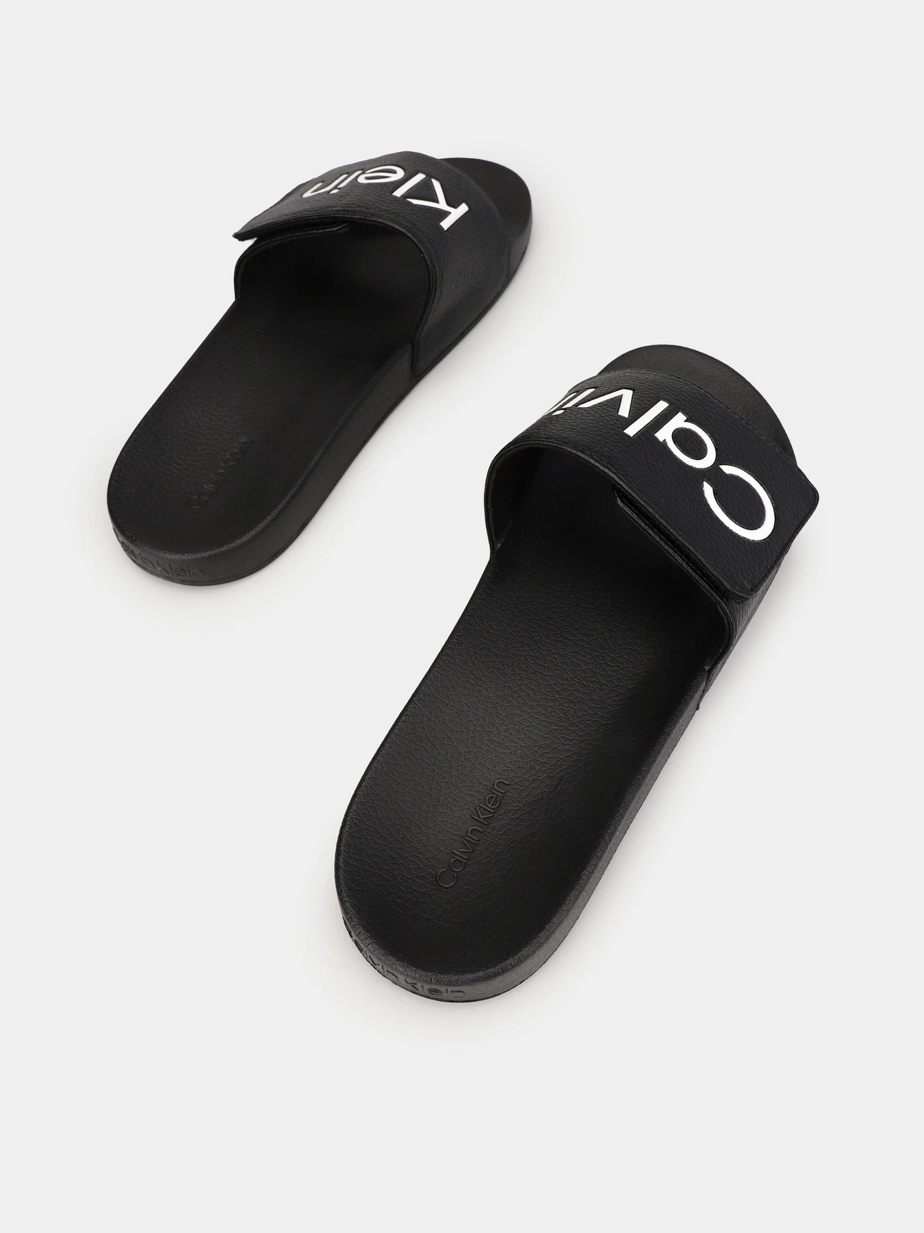 Шлёпанцы Calvin Klein Adj Pool Slide Pu модель HM0HM00957-BEH Шлёпанцы Calvin Klein Adj Pool Slide Pu модель HM0HM00957-BEH Фото