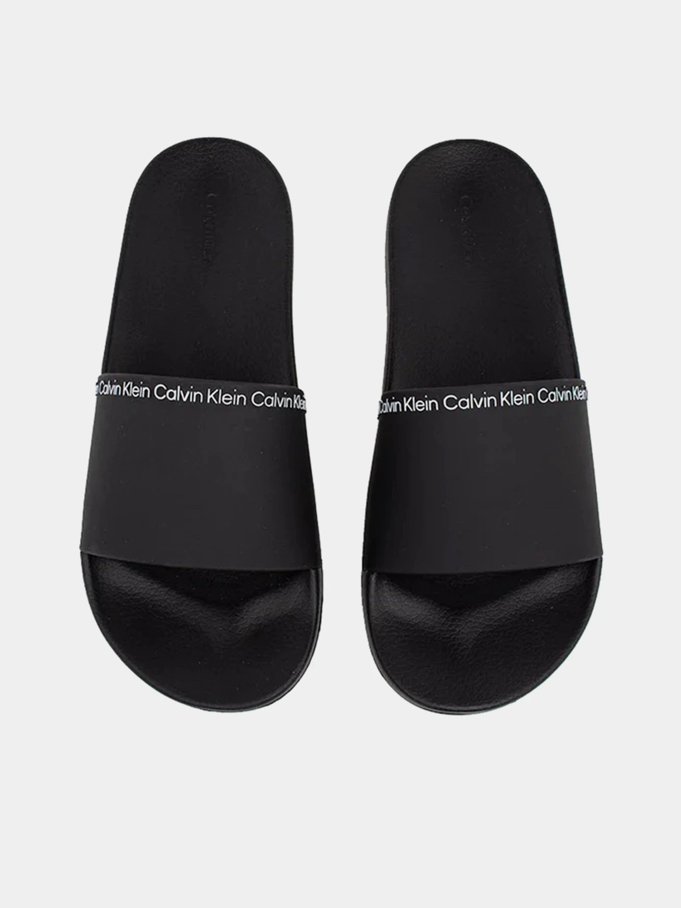 Шлёпанцы Calvin Klein Pool Slide Rubber модель HM0HM00981-BEH Шлёпанцы Calvin Klein Pool Slide Rubber модель HM0HM00981-BEH Фото