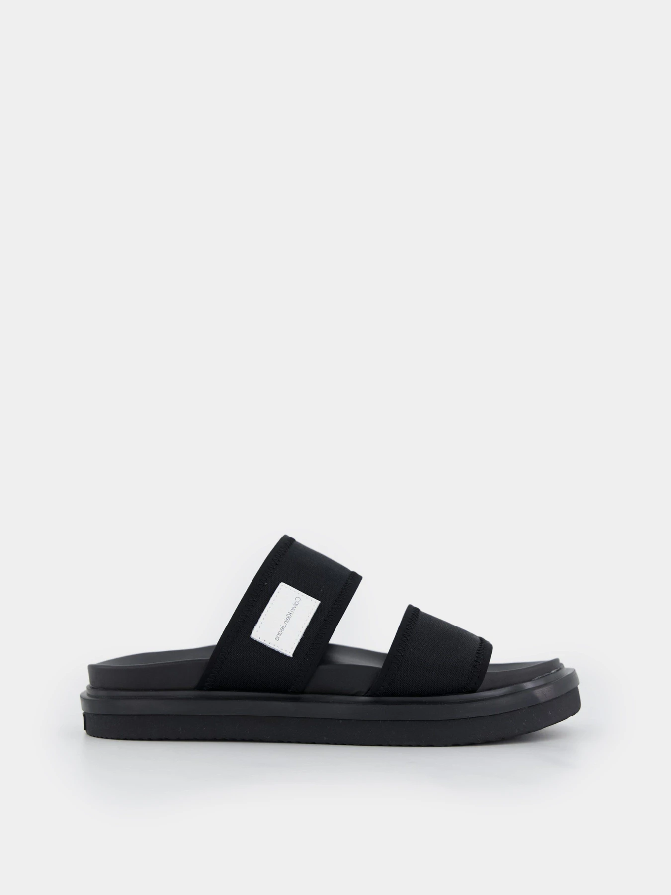Шльопанці Calvin Klein Sandal Doublebar Badge модель YM0YM00642-BDS Шльопанці Calvin Klein Sandal Doublebar Badge модель YM0YM00642-BDS Фото