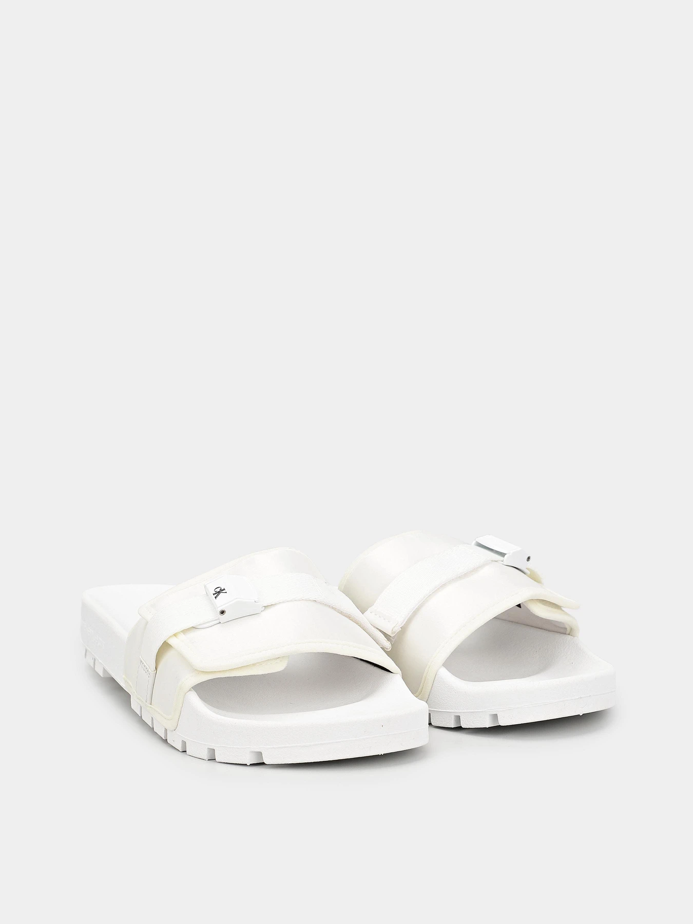 Шлёпанцы Calvin Klein Truck Slide Velcro модель YM0YM00693-0LA Шлёпанцы Calvin Klein Truck Slide Velcro модель YM0YM00693-0LA Фото