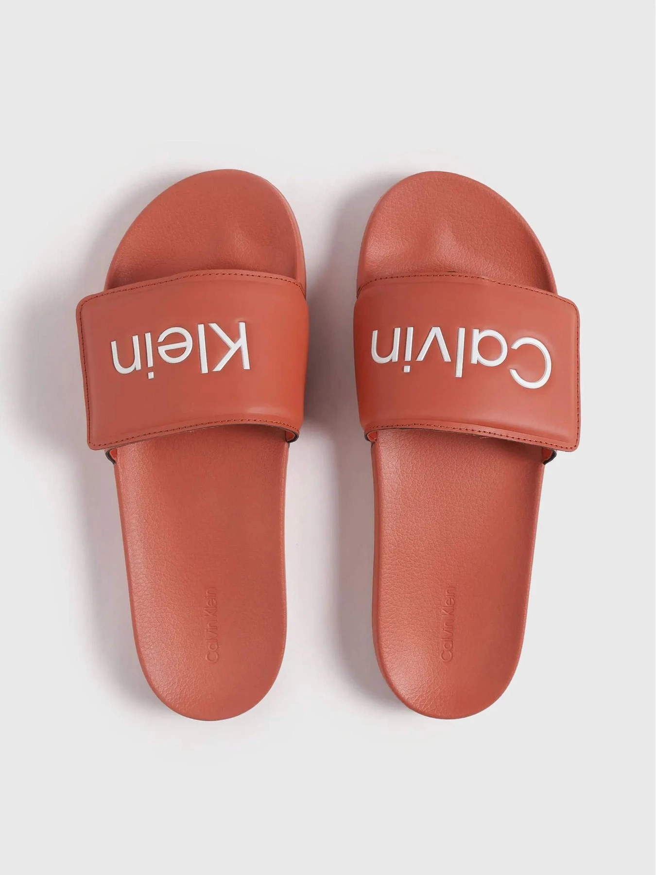Шльопанці Calvin Klein Pool Slide Adj модель HM0HM01357-GOZ Шльопанці Calvin Klein Pool Slide Adj модель HM0HM01357-GOZ Фото