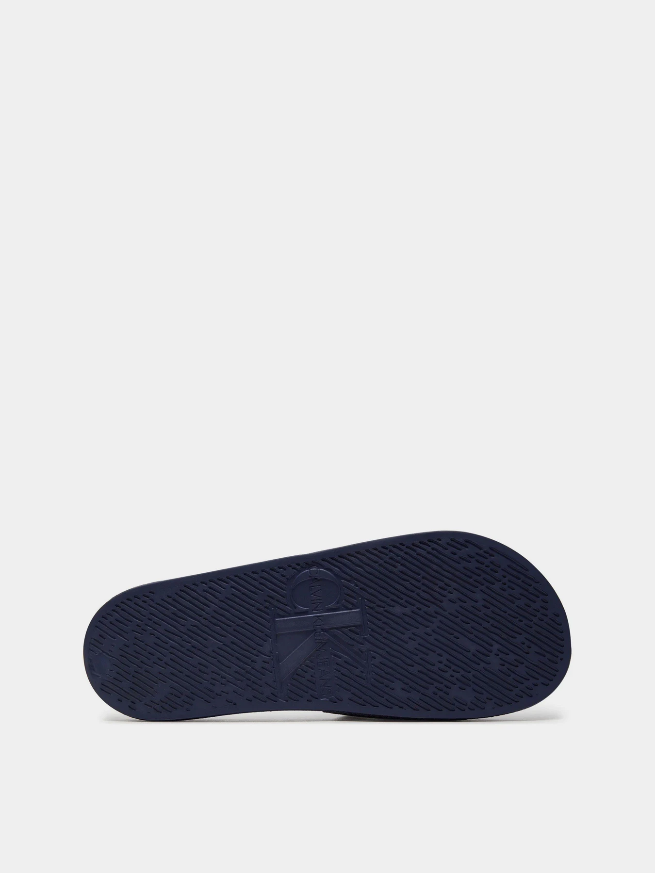 Шльопанці Calvin Klein Slide Monogram Co модель YM0YM00061-0G2 Фото