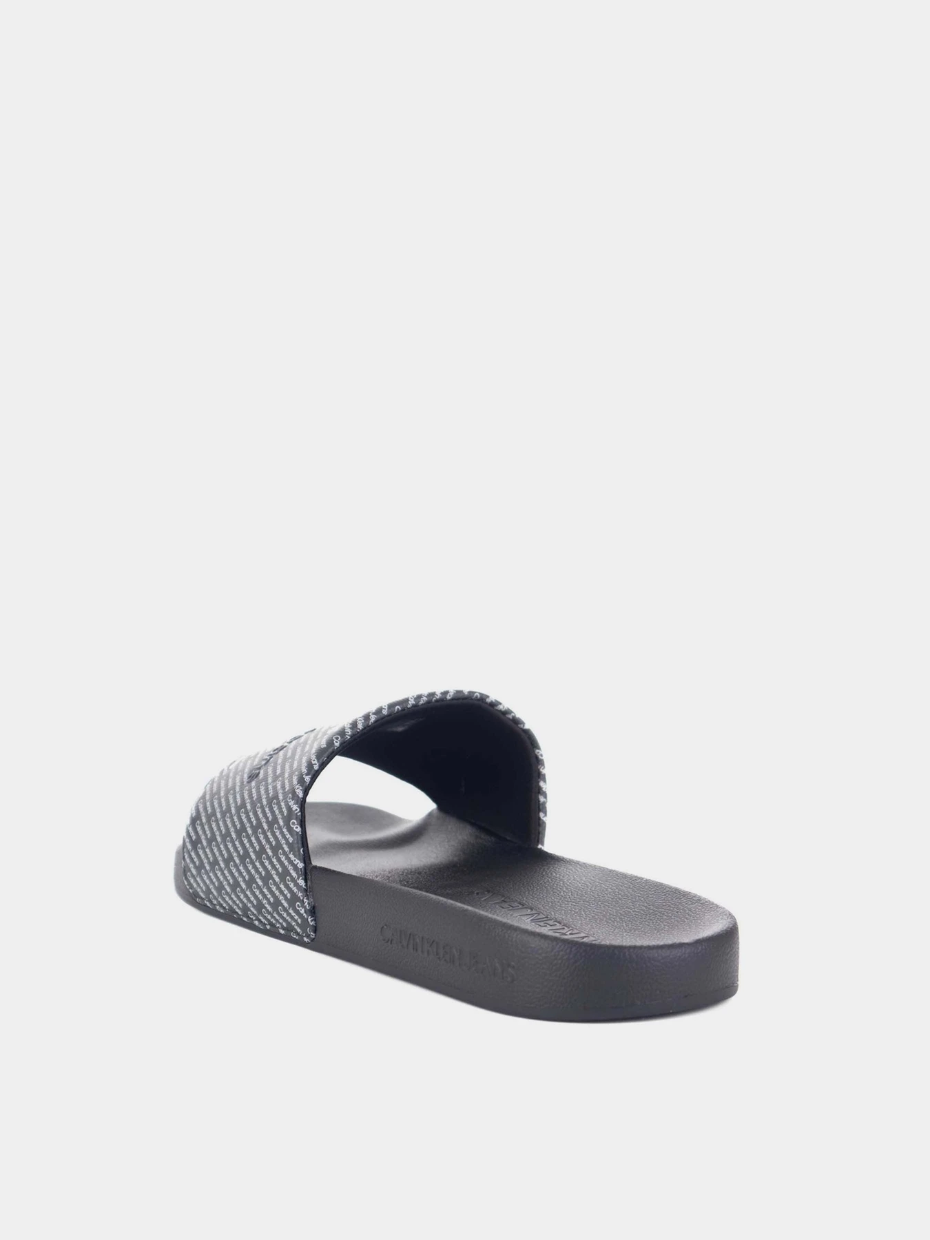 Шльопанці Calvin Klein Slide Aop модель YM0YM00955-0GM Шльопанці Calvin Klein Slide Aop модель YM0YM00955-0GM Фото