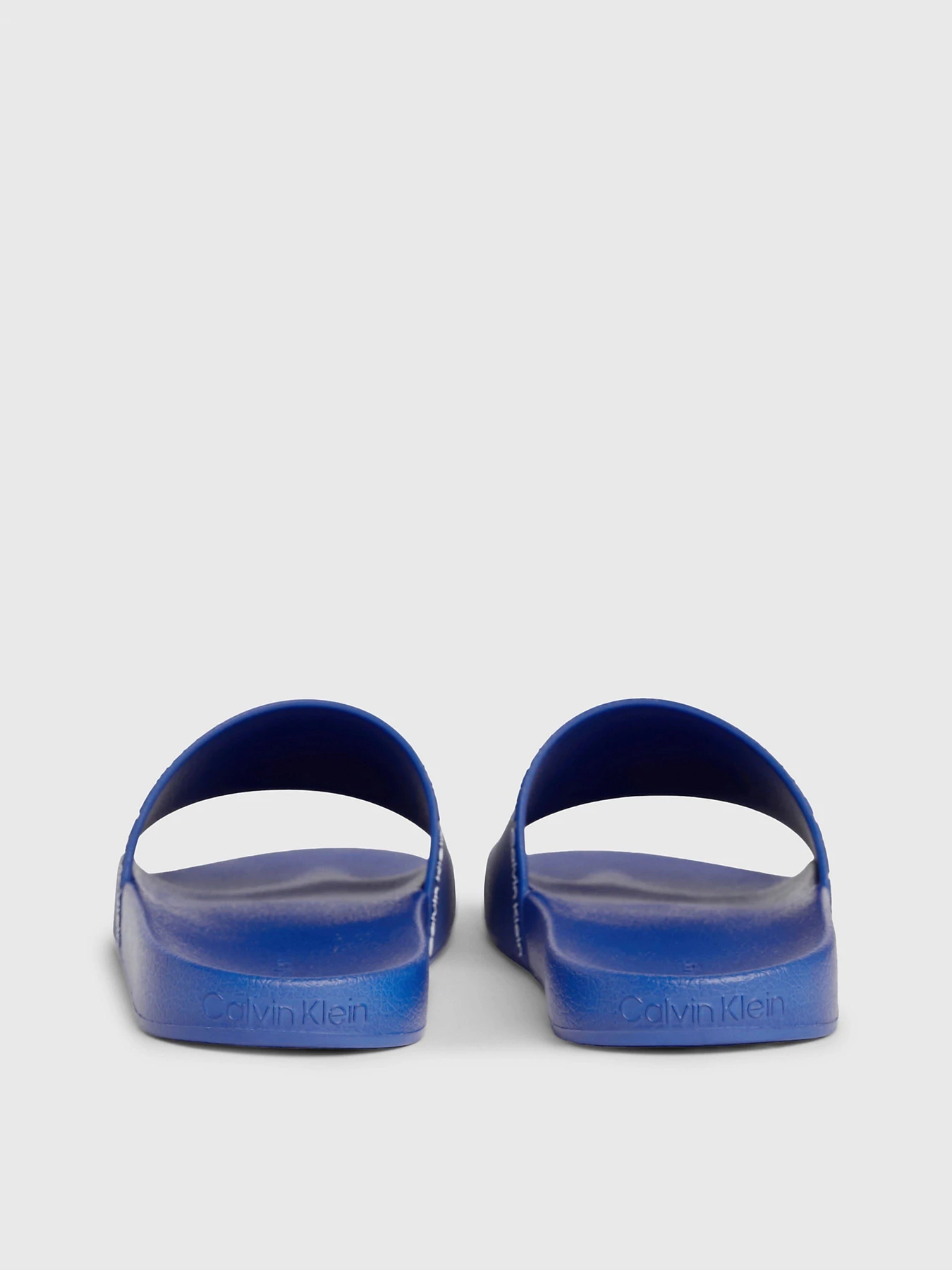 Шльопанці Calvin Klein Pool Slide Rubber модель HM0HM00981-C41 Фото