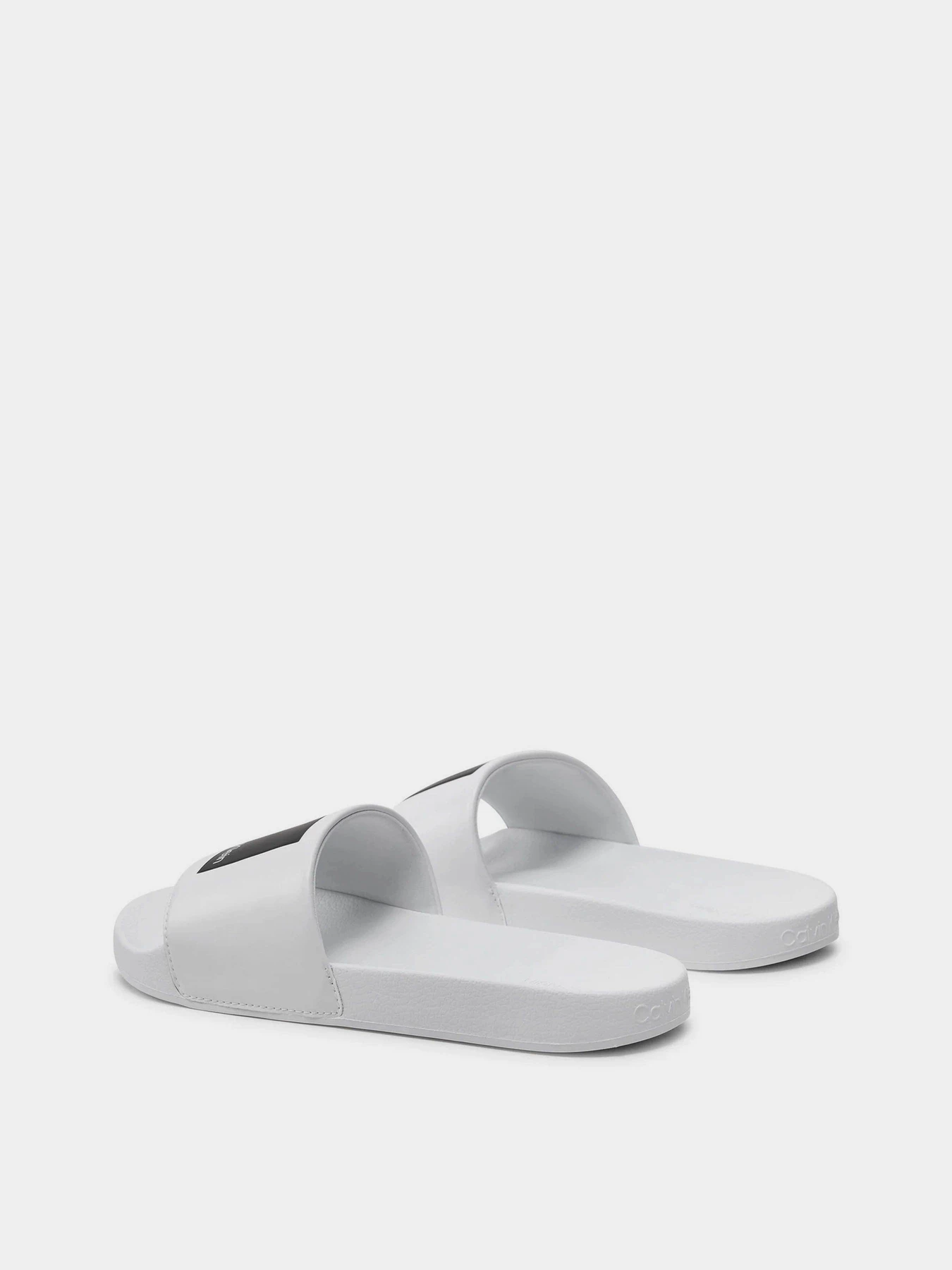 Шльопанці Calvin Klein Pool Slide Hf Logo модель HM0HM01466-YBR Шльопанці Calvin Klein Pool Slide Hf Logo модель HM0HM01466-YBR Фото