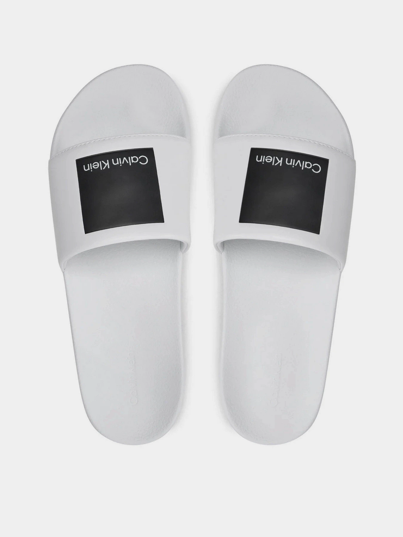 Шльопанці Calvin Klein Pool Slide Hf Logo модель HM0HM01466-YBR Шльопанці Calvin Klein Pool Slide Hf Logo модель HM0HM01466-YBR Фото
