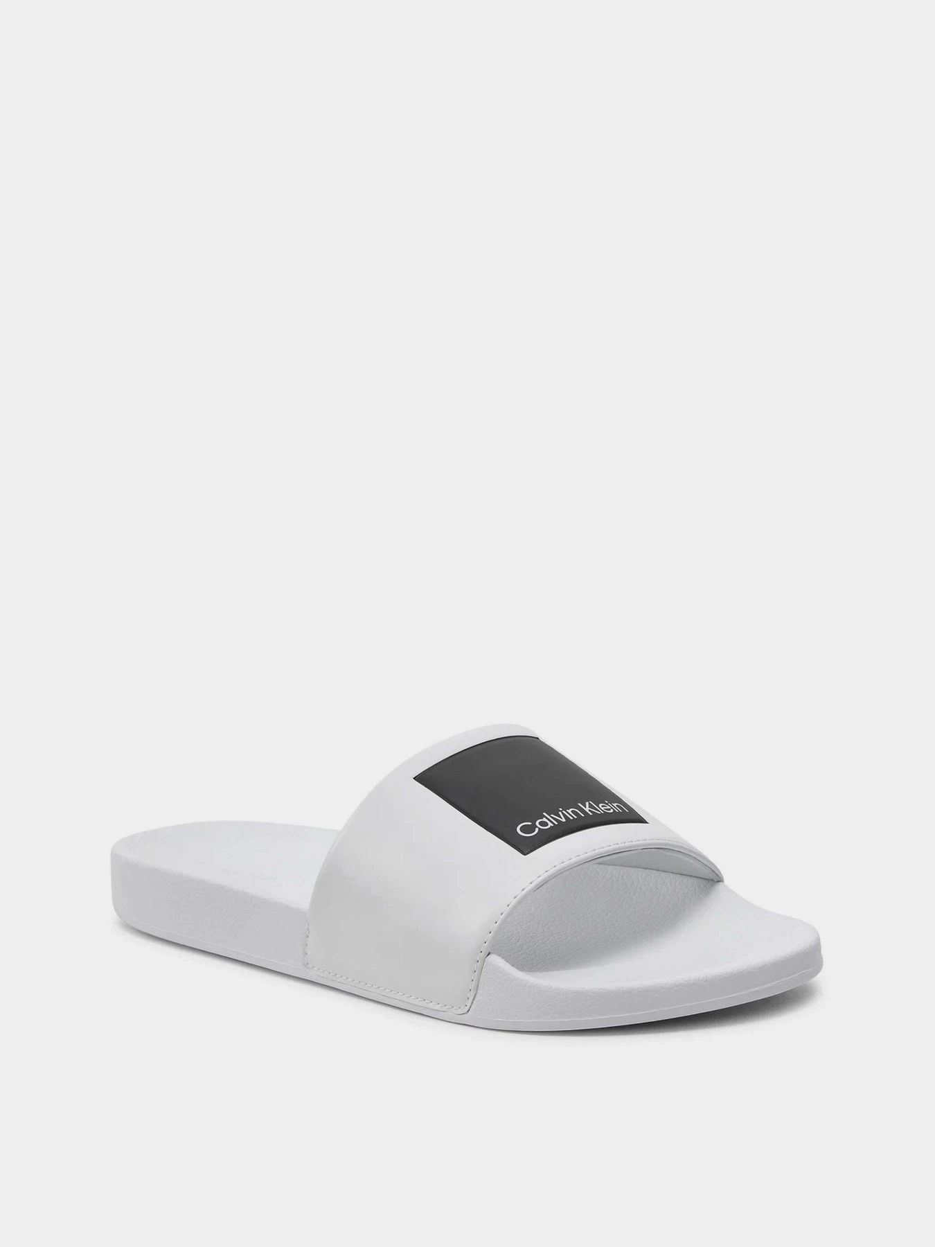 Шльопанці Calvin Klein Pool Slide Hf Logo модель HM0HM01466-YBR Шльопанці Calvin Klein Pool Slide Hf Logo модель HM0HM01466-YBR Фото