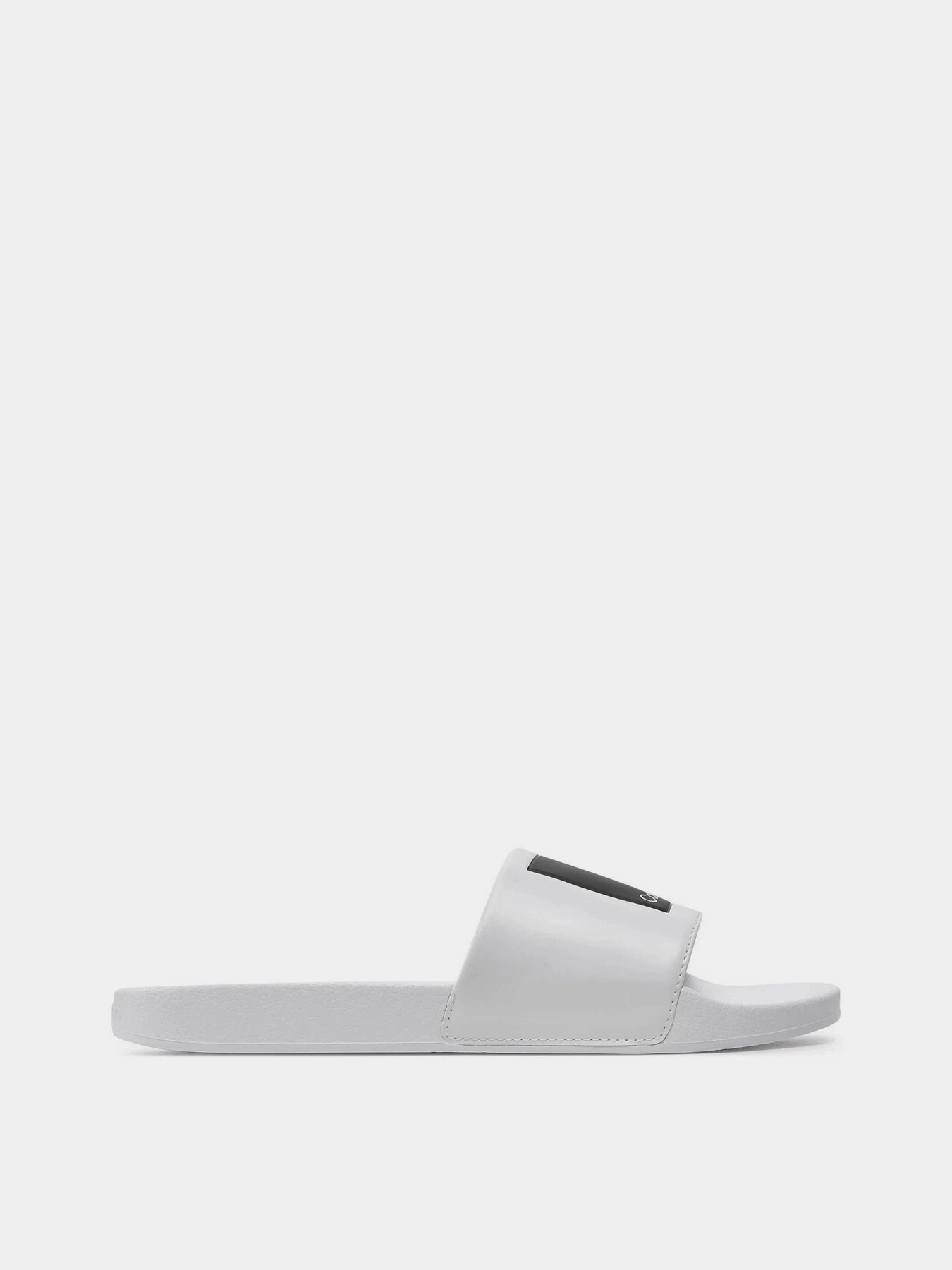 Шльопанці Calvin Klein Pool Slide Hf Logo модель HM0HM01466-YBR Шльопанці Calvin Klein Pool Slide Hf Logo модель HM0HM01466-YBR Фото