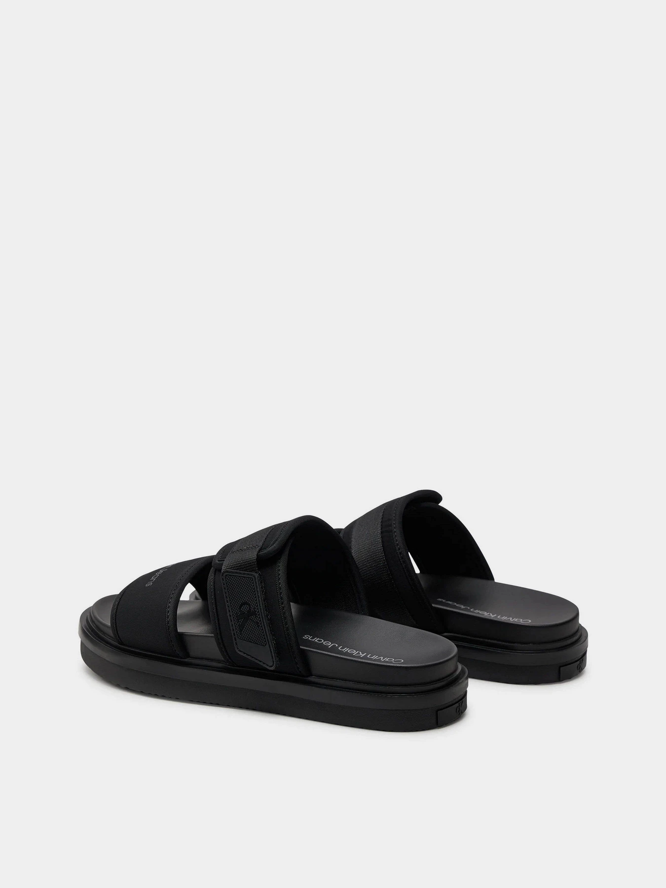 Шльопанці Calvin Klein Double Bar Sandal Wb In Br модель YM0YM00946-0GT Шльопанці Calvin Klein Double Bar Sandal Wb In Br модель YM0YM00946-0GT Фото